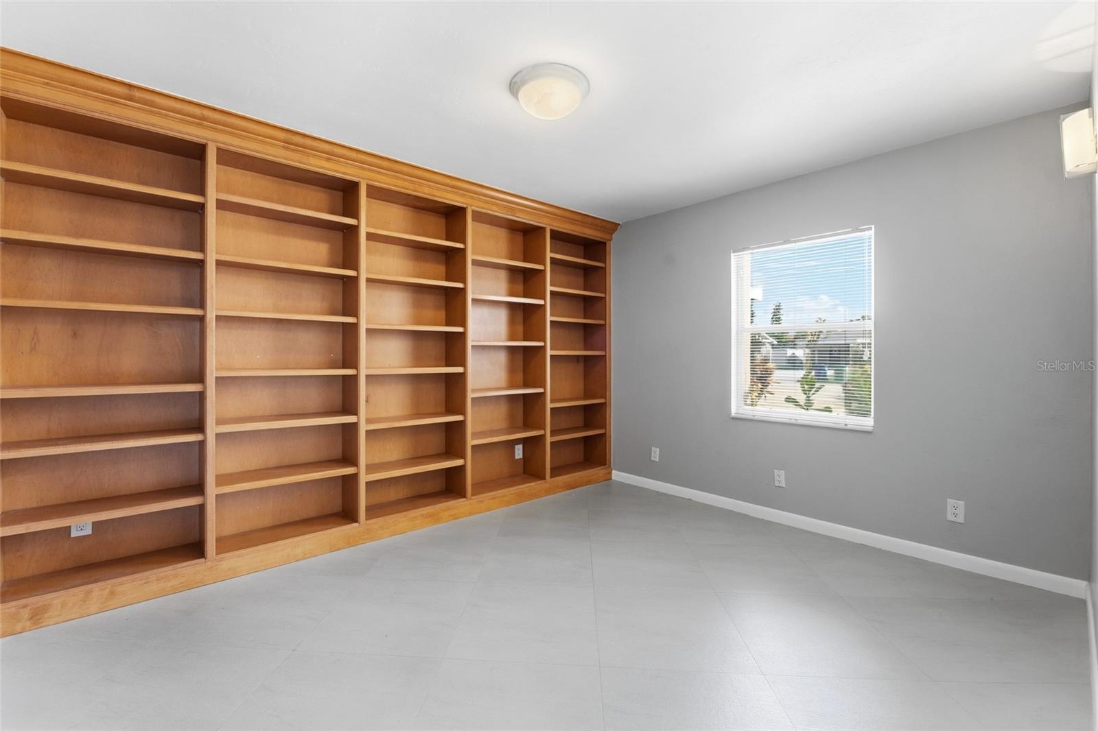bedroom 3 with built in shelves