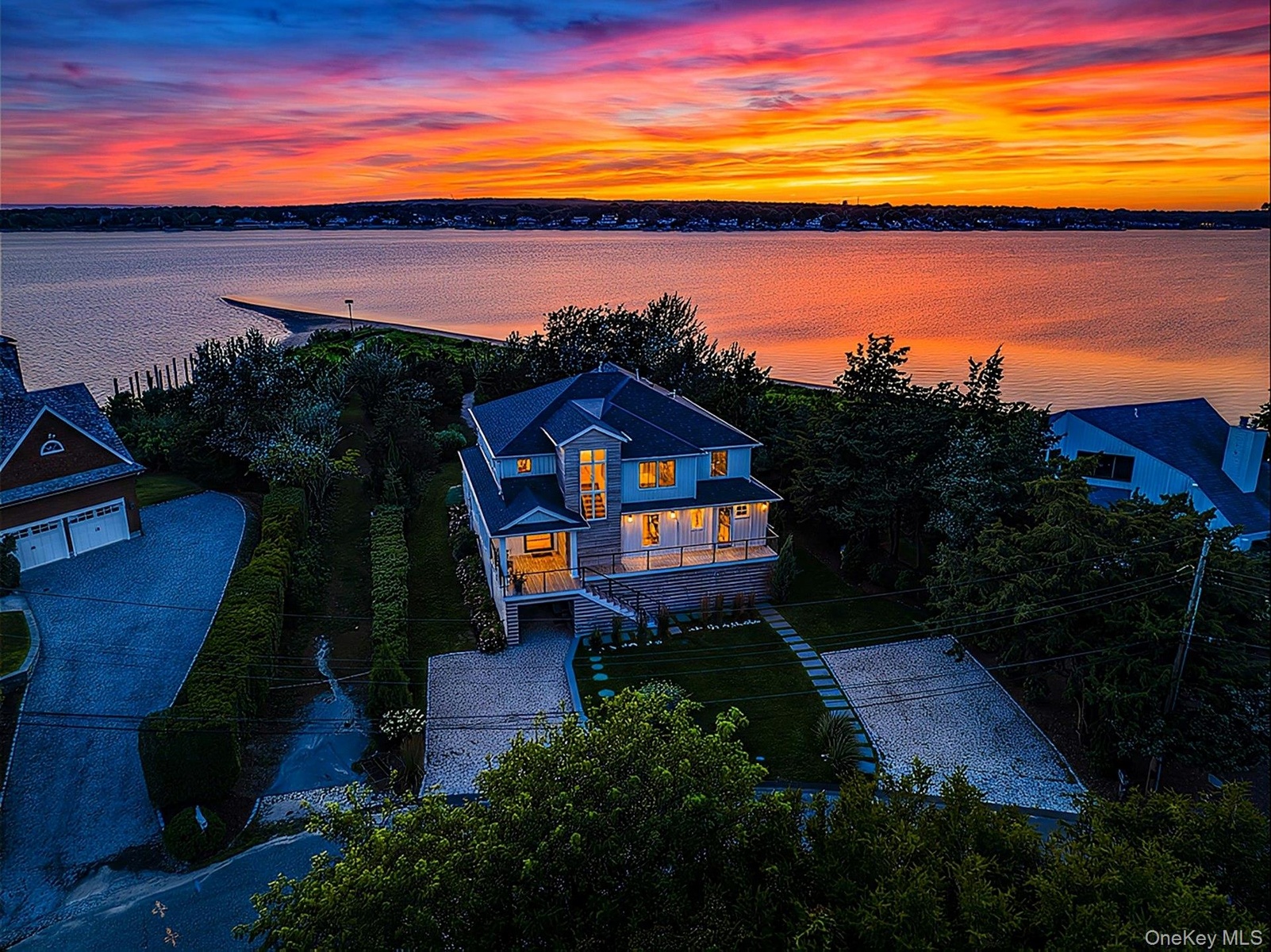 Waterfront property featuring a private beach and direct water access