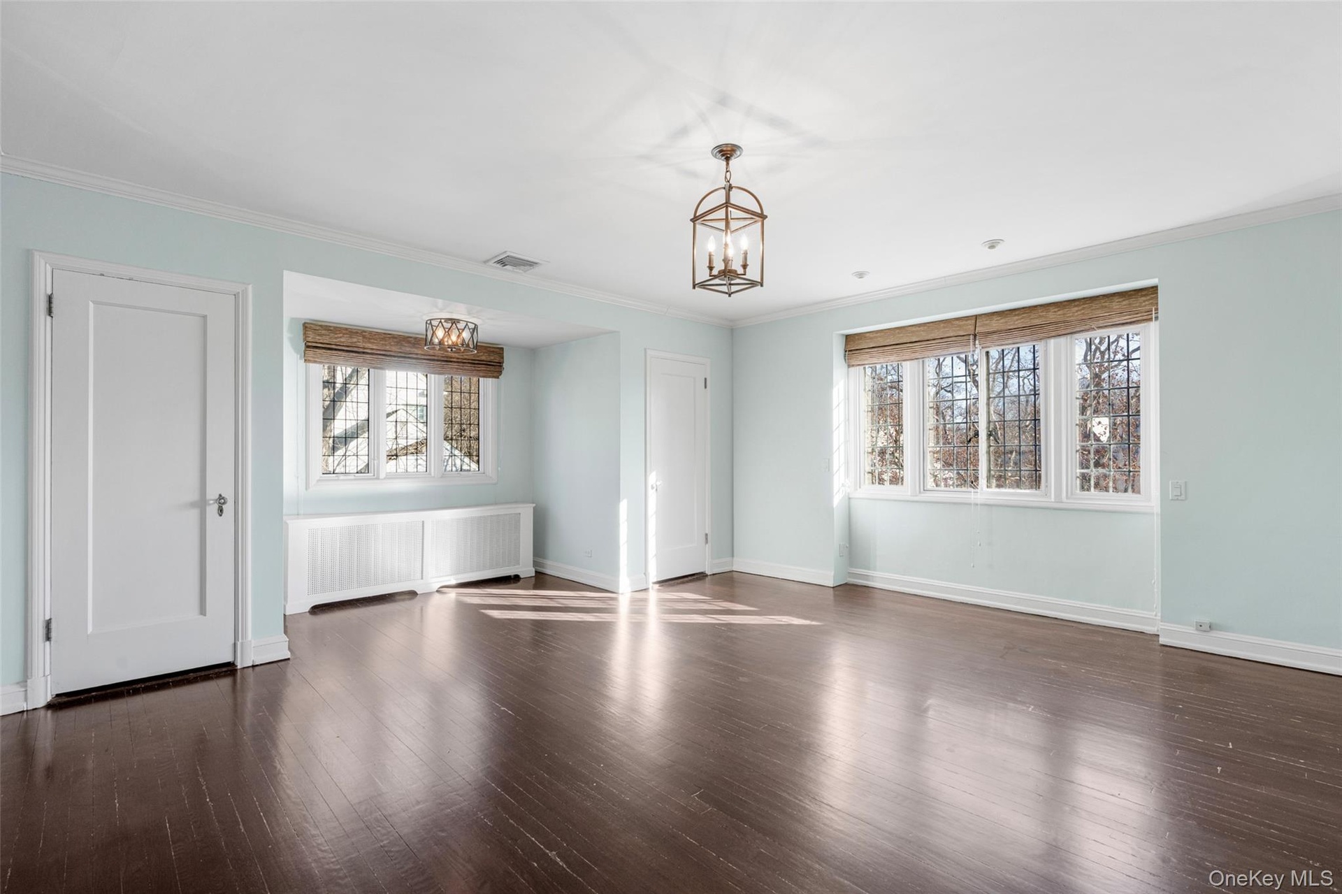 Large primary bedroom with 2 closets as well as a walk in closet and en suite bath.