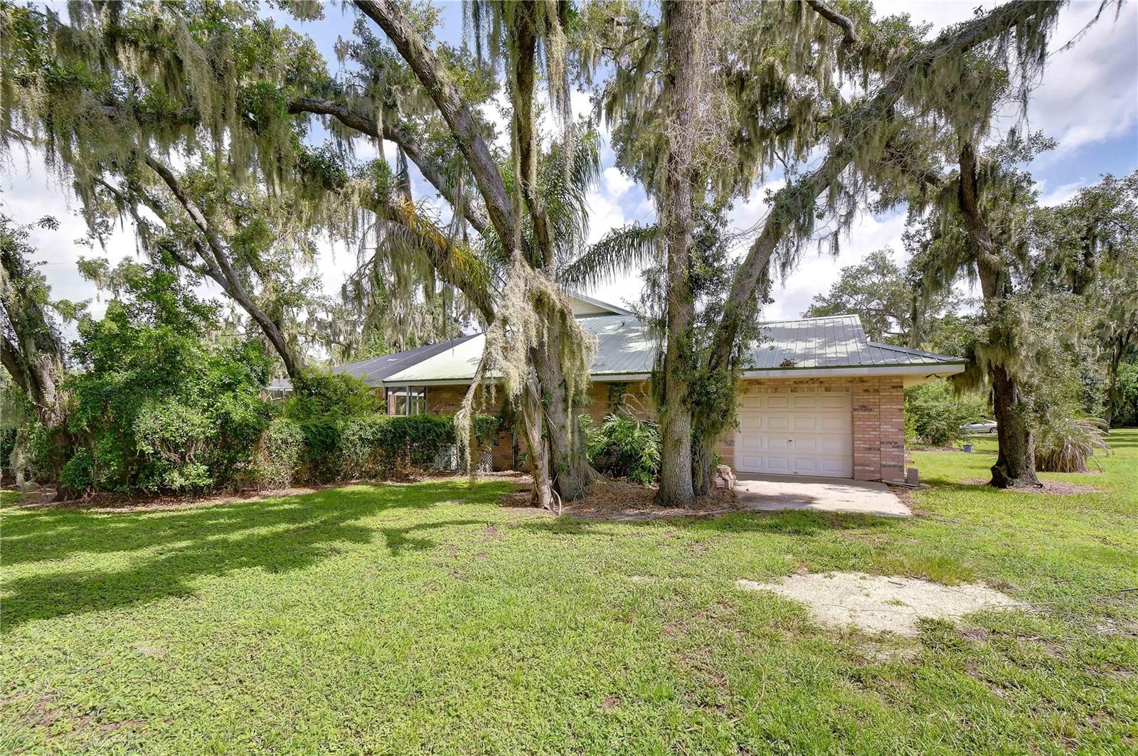 Attached garage with additional in-law suite access.