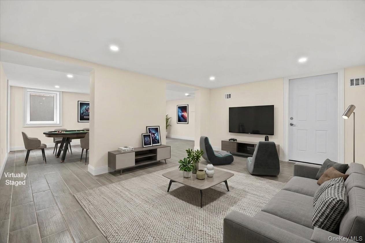 virtually staged main area of the basement