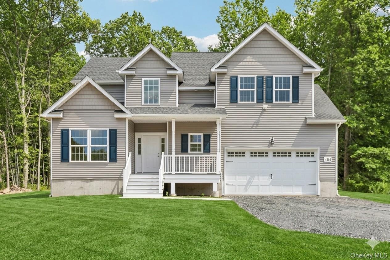 Beautiful colonial home.  Lawn is an AI-generated rendering.