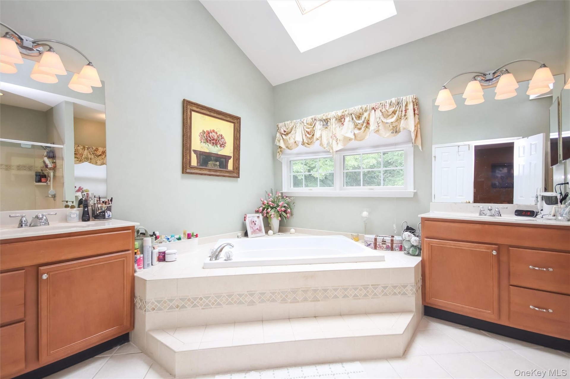 Master suite spa bath w/ his & hers vanities