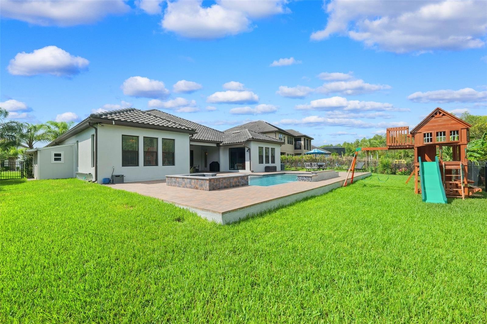 Beyond the pool deck you will find plenty of green space for kids and pets not to mention the view of the lush green preserve.