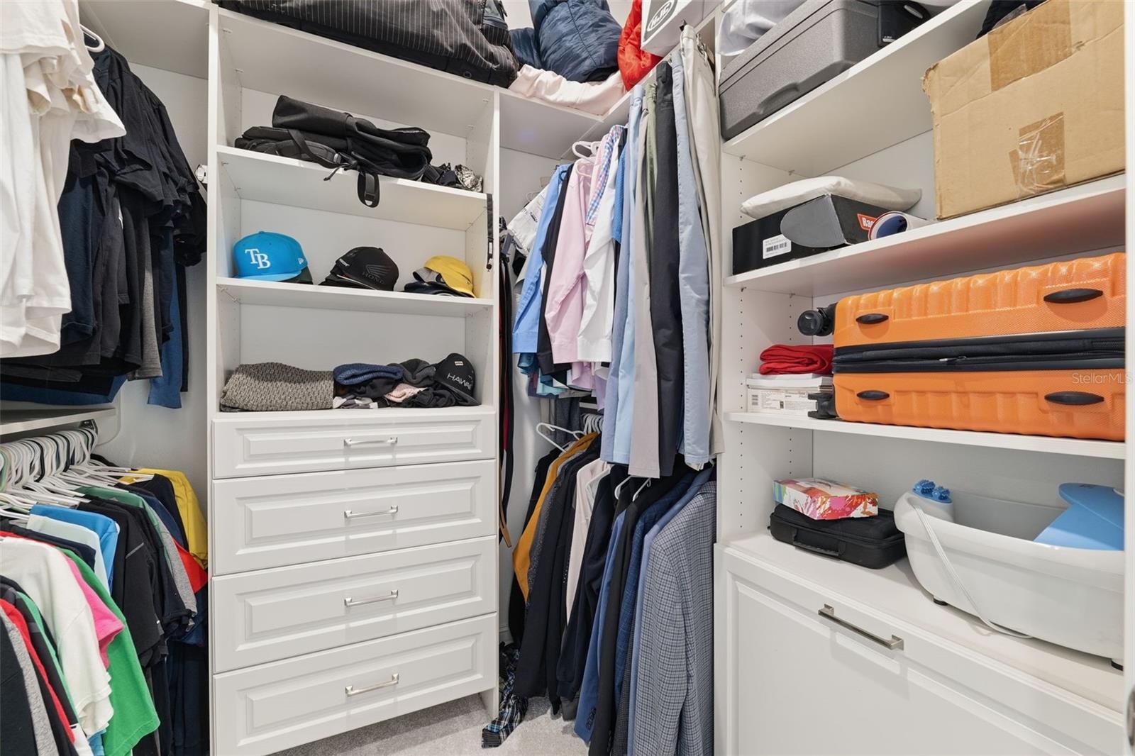 The primary bedroom offers "his and hers" walk-in closets.