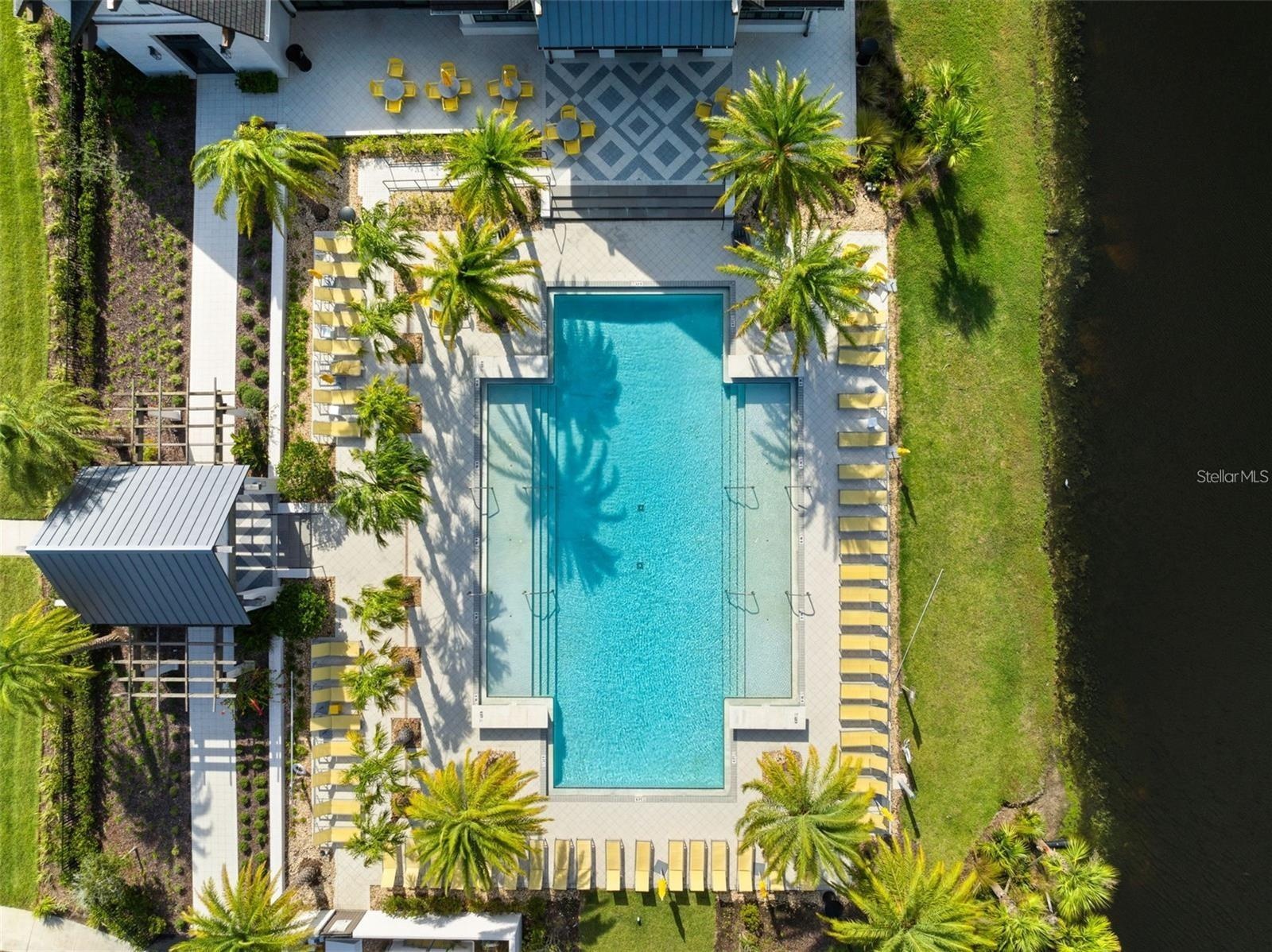 Resort style community clubhouse with a community pool, fitness center and lake front pool.