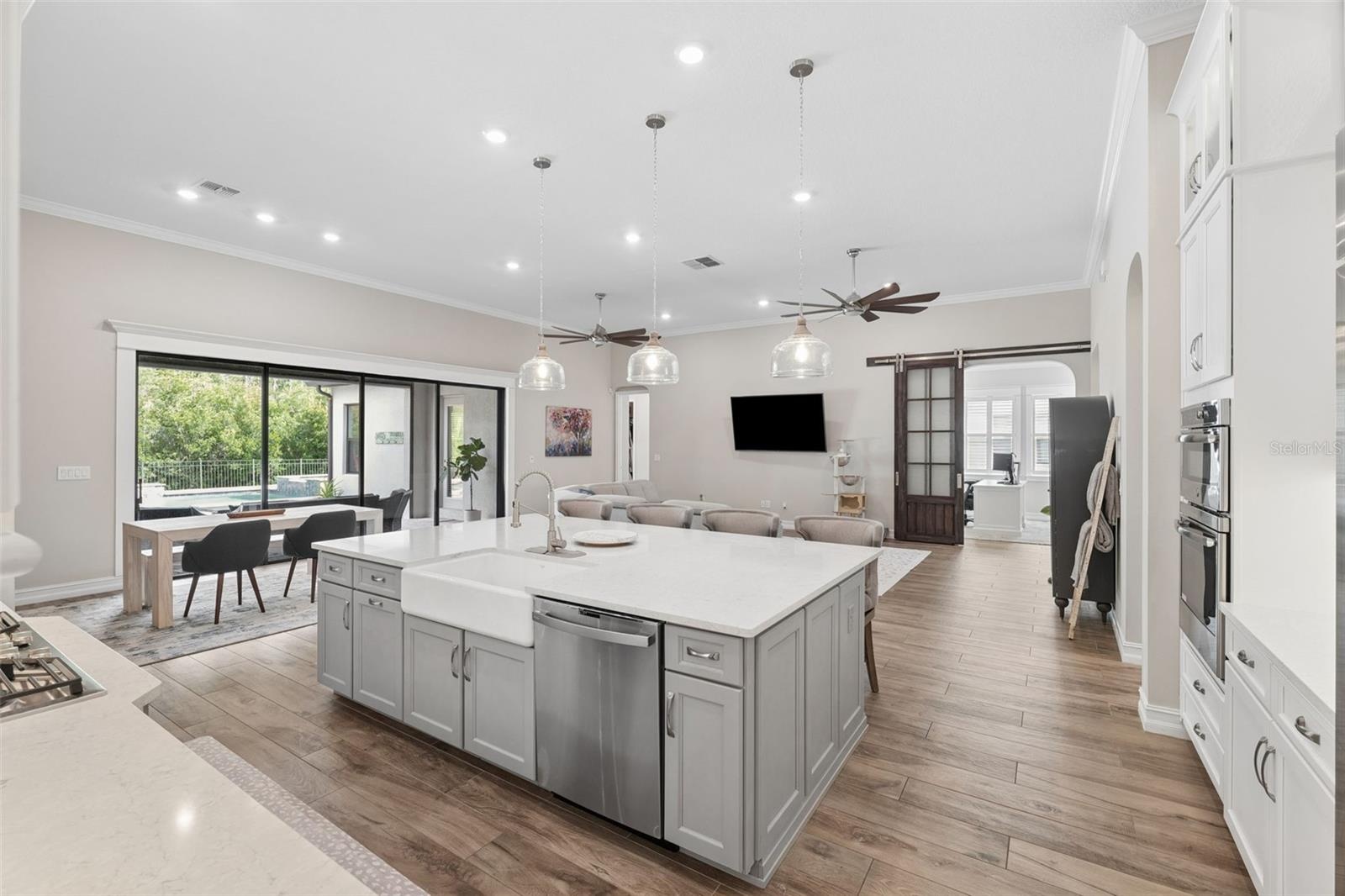 The kitchen opens out onto the main living space and second dining area.