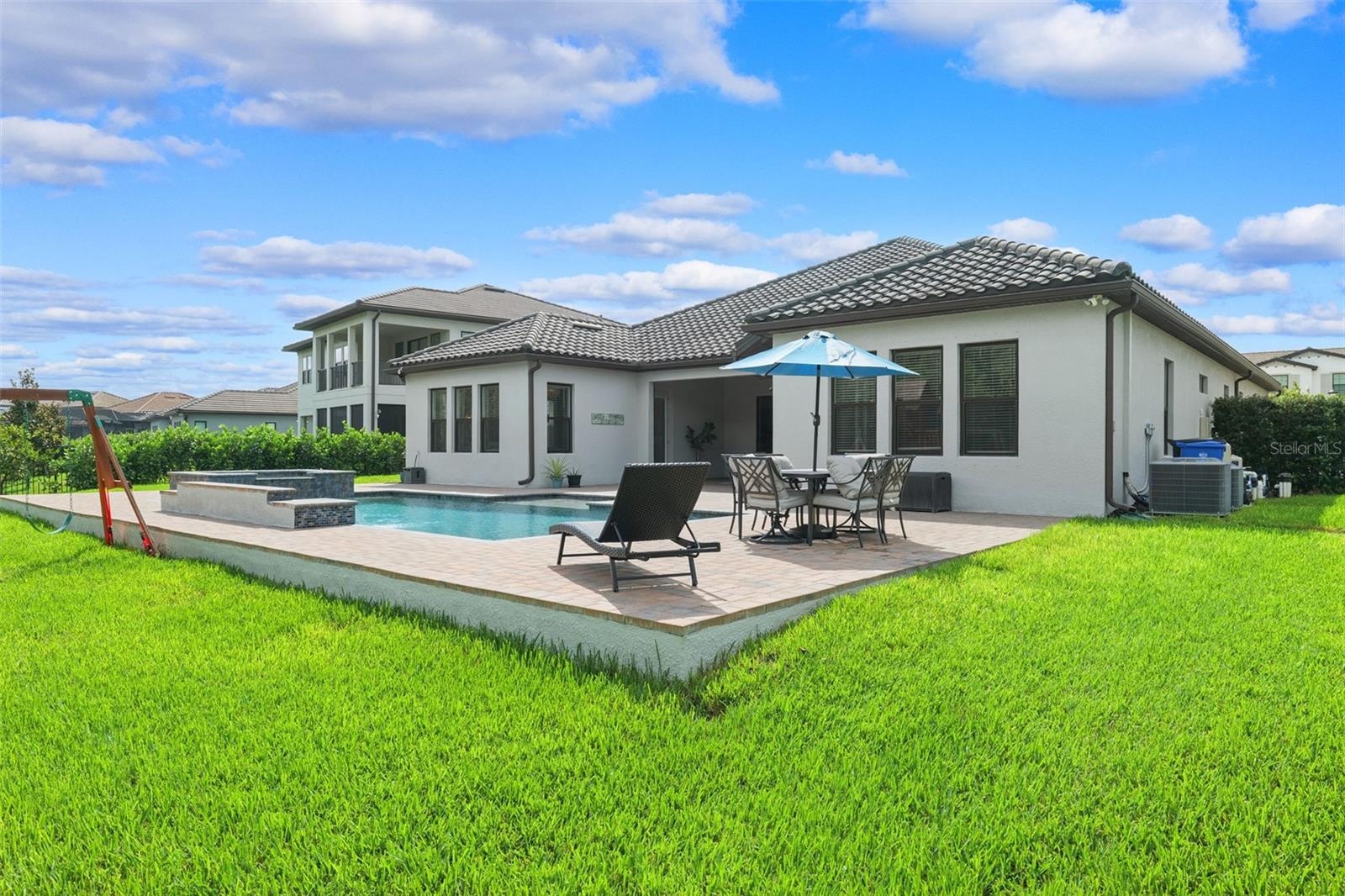 Beyond the pool deck you will find plenty of green space for kids and pets not to mention the view of the lush green preserve.