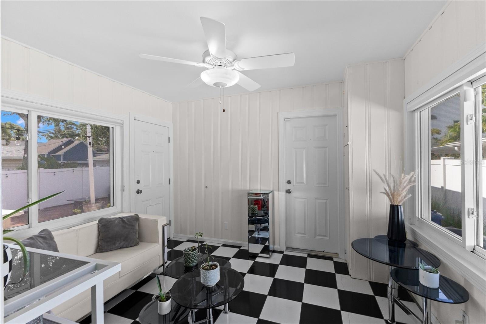 Sun Room with garage entrance straight ahead