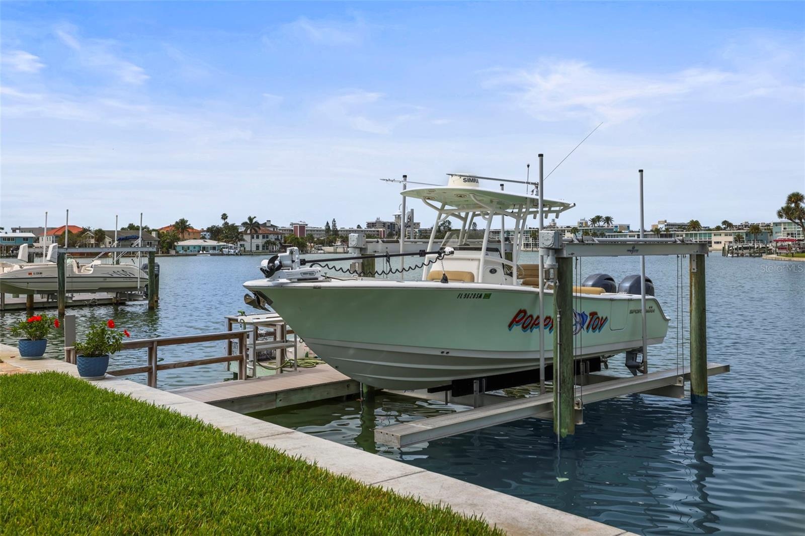 Boat dock with electric lift.