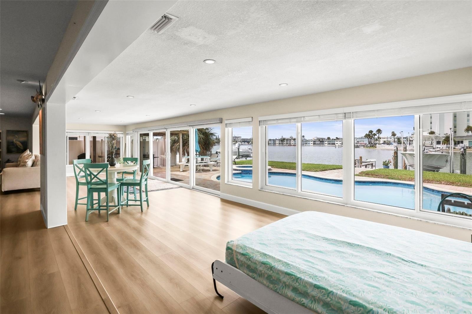Open Murphy bed facing the FLorida room.