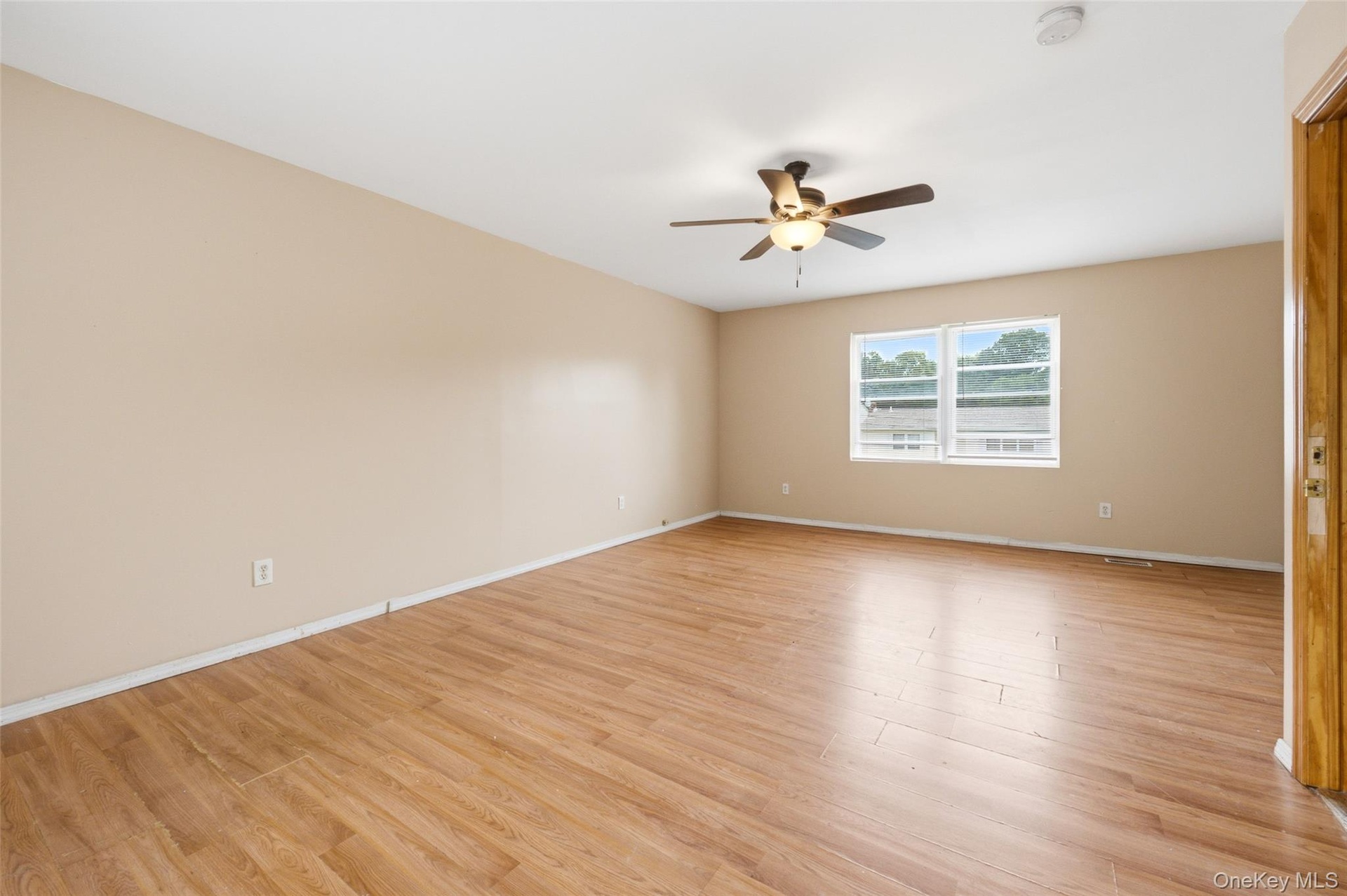 Large Primary Bedroom on the 2nd floor.  Bedroom stretches from the front of the house to the back of the house.  The window in this pic faces the fro