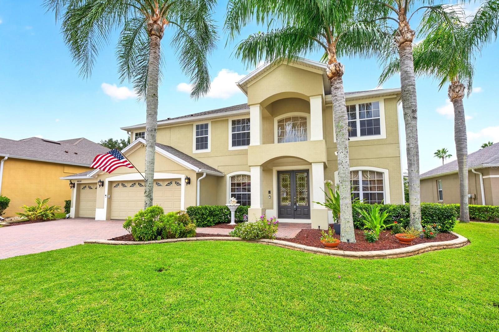 Outside of the hustle and bustle while still enjoying easy access to everything Lake Nona has to offer, this impressive POOL HOME in the GATED Lavina 