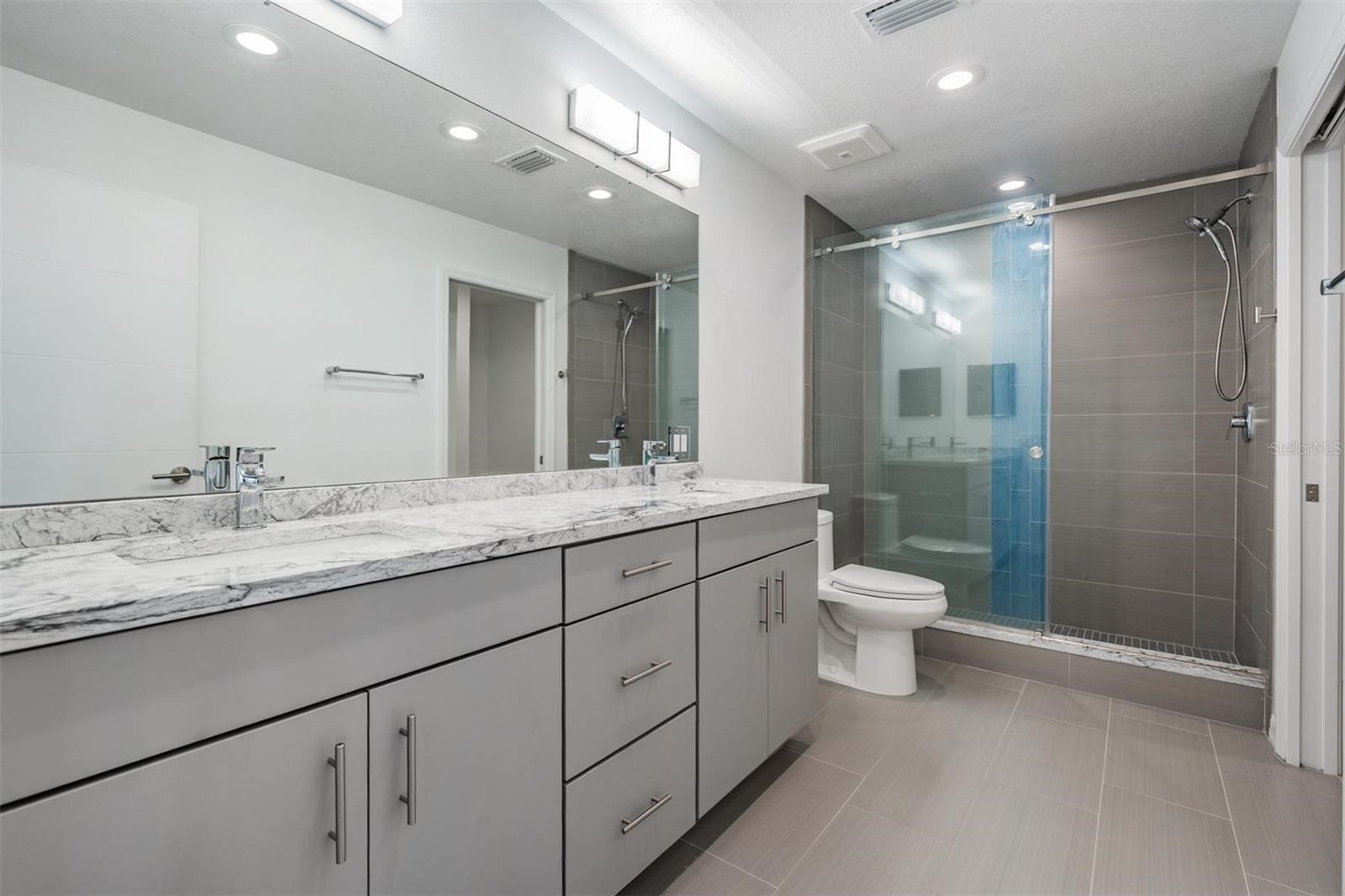 Master #2 Bathroom with Dual Vanities, Large Shower and Storage