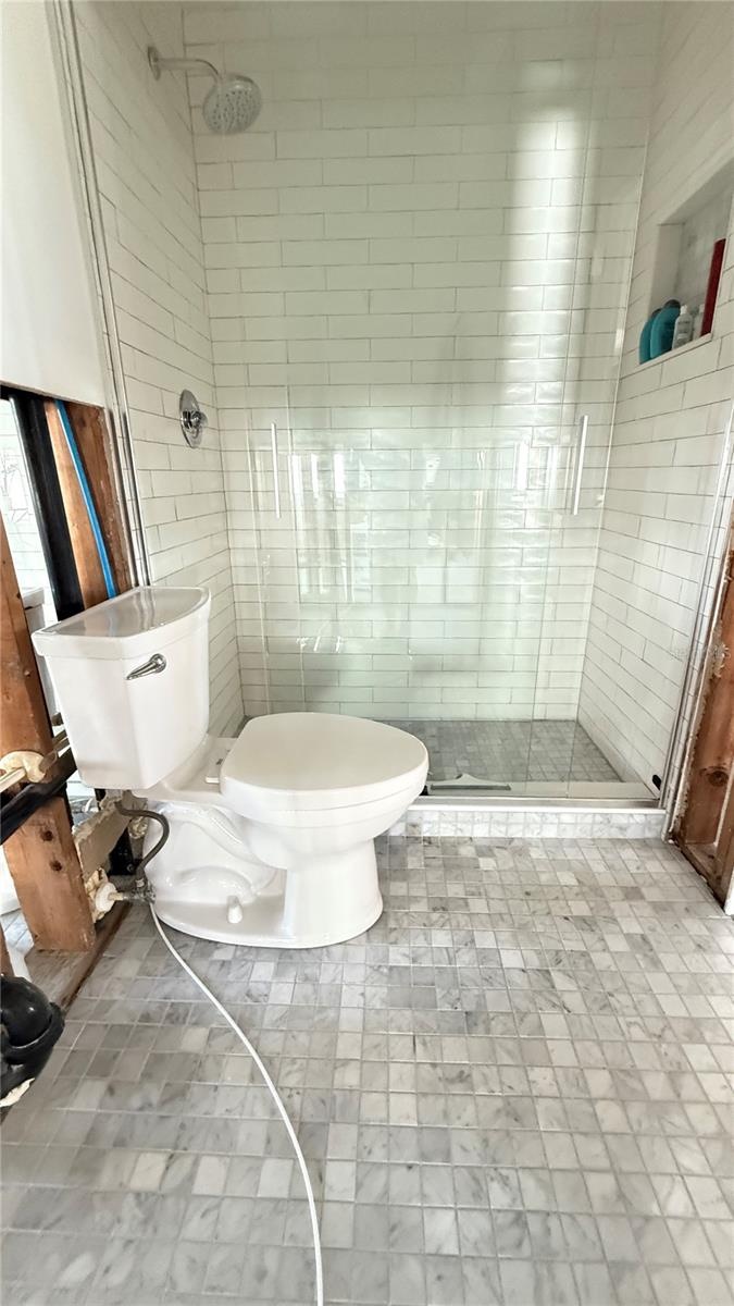 Ensuite bathroom to street side bedroom.  Bathrooms were remodeled prior to the storm.