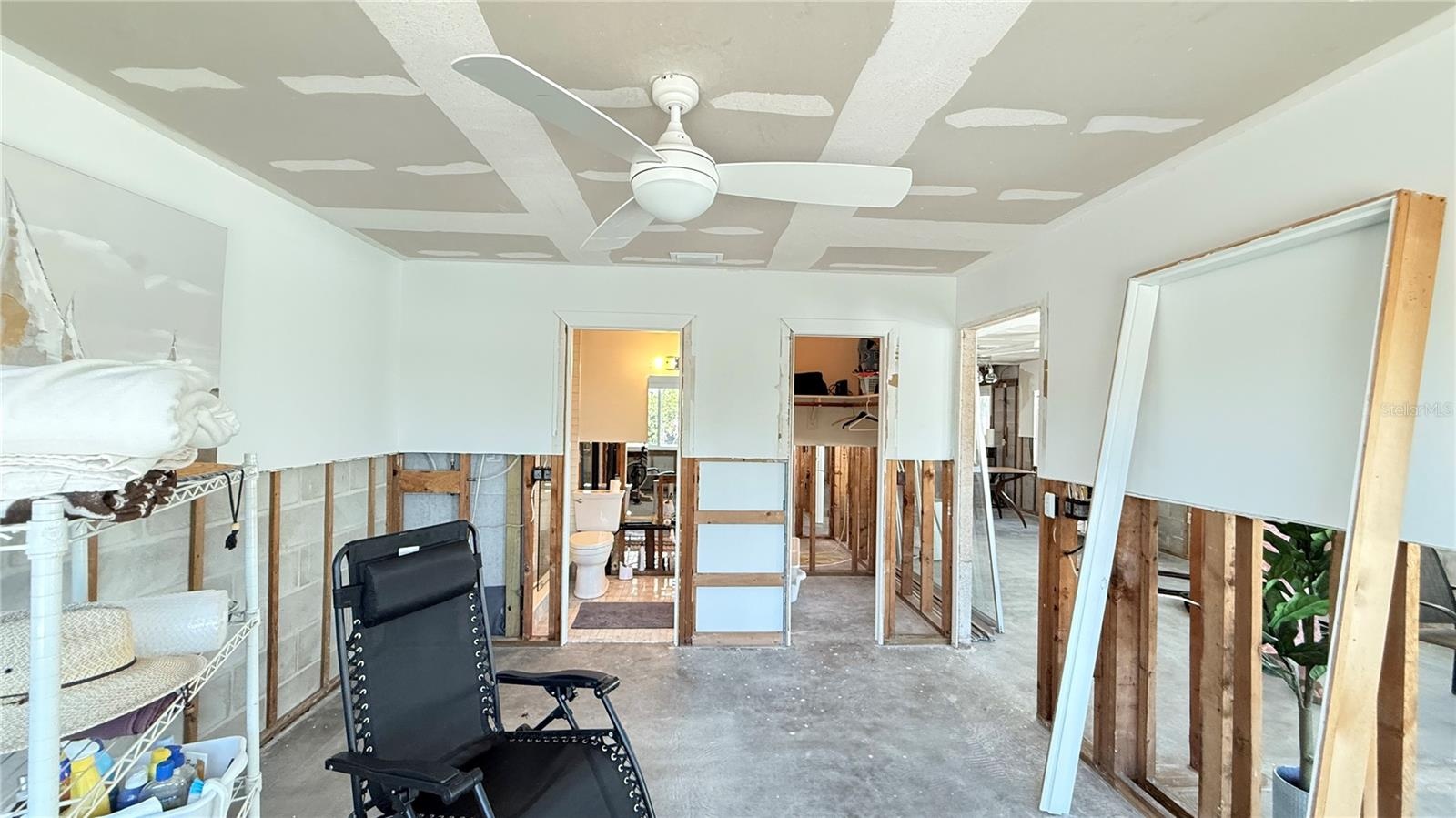 Canal side bedroom with ensuite bathroom and walk in closet
