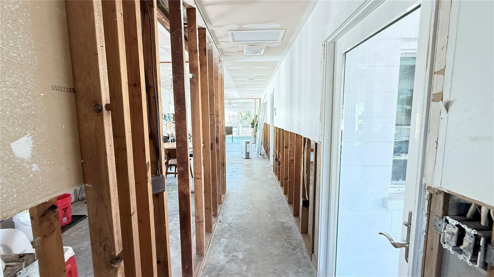 Main entry looking down hallway towards living area