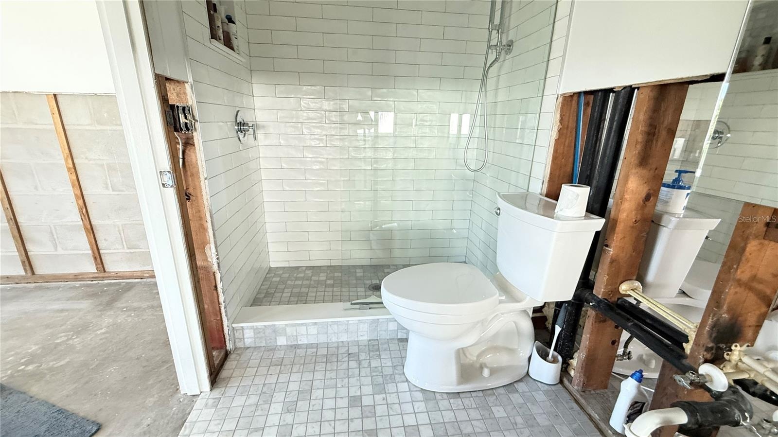 Canal side ensuite bathroom with shower.  Bathrooms were remodeled prior to the storm.