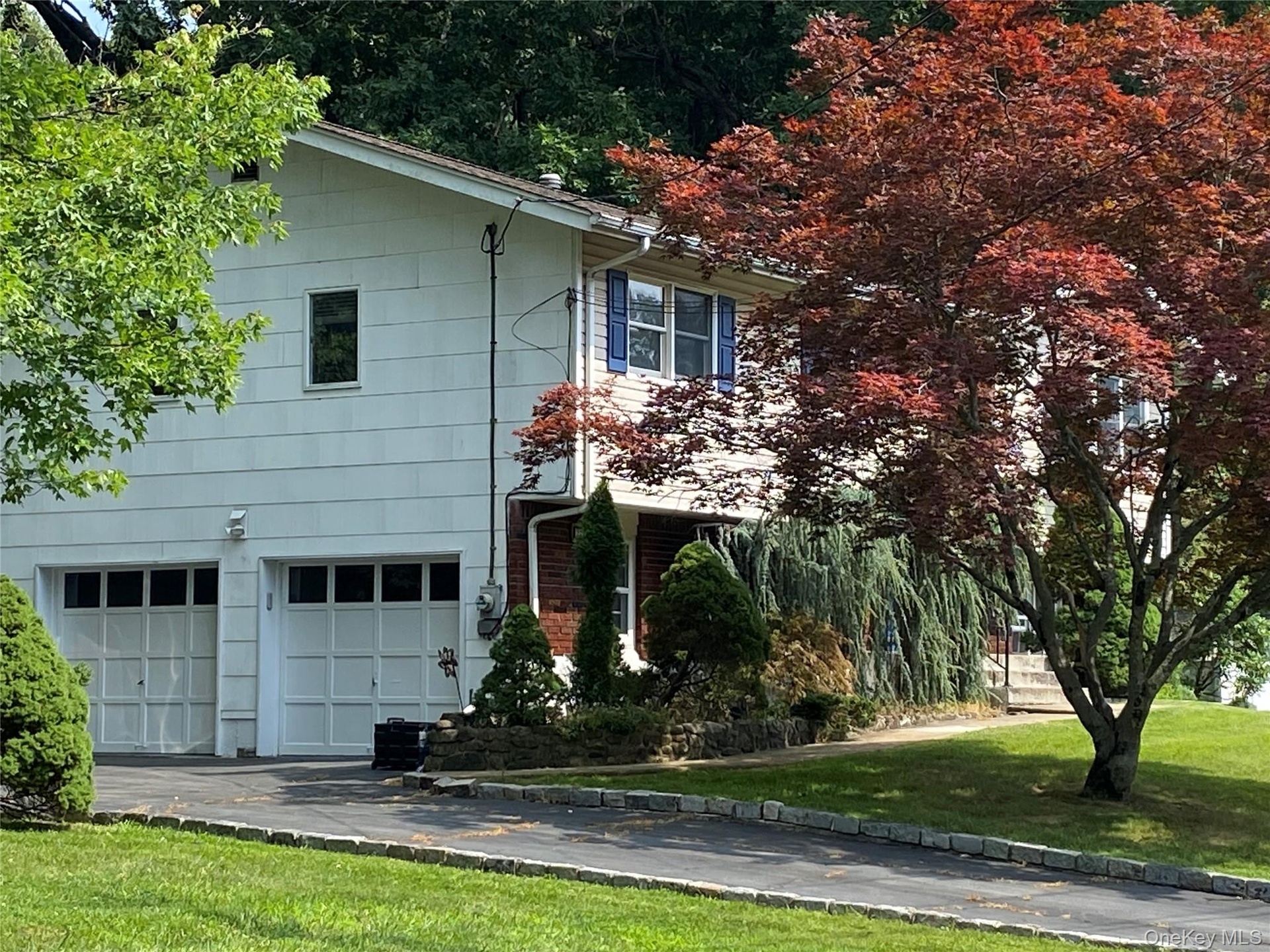 2 car garage plus additional parking on driveway