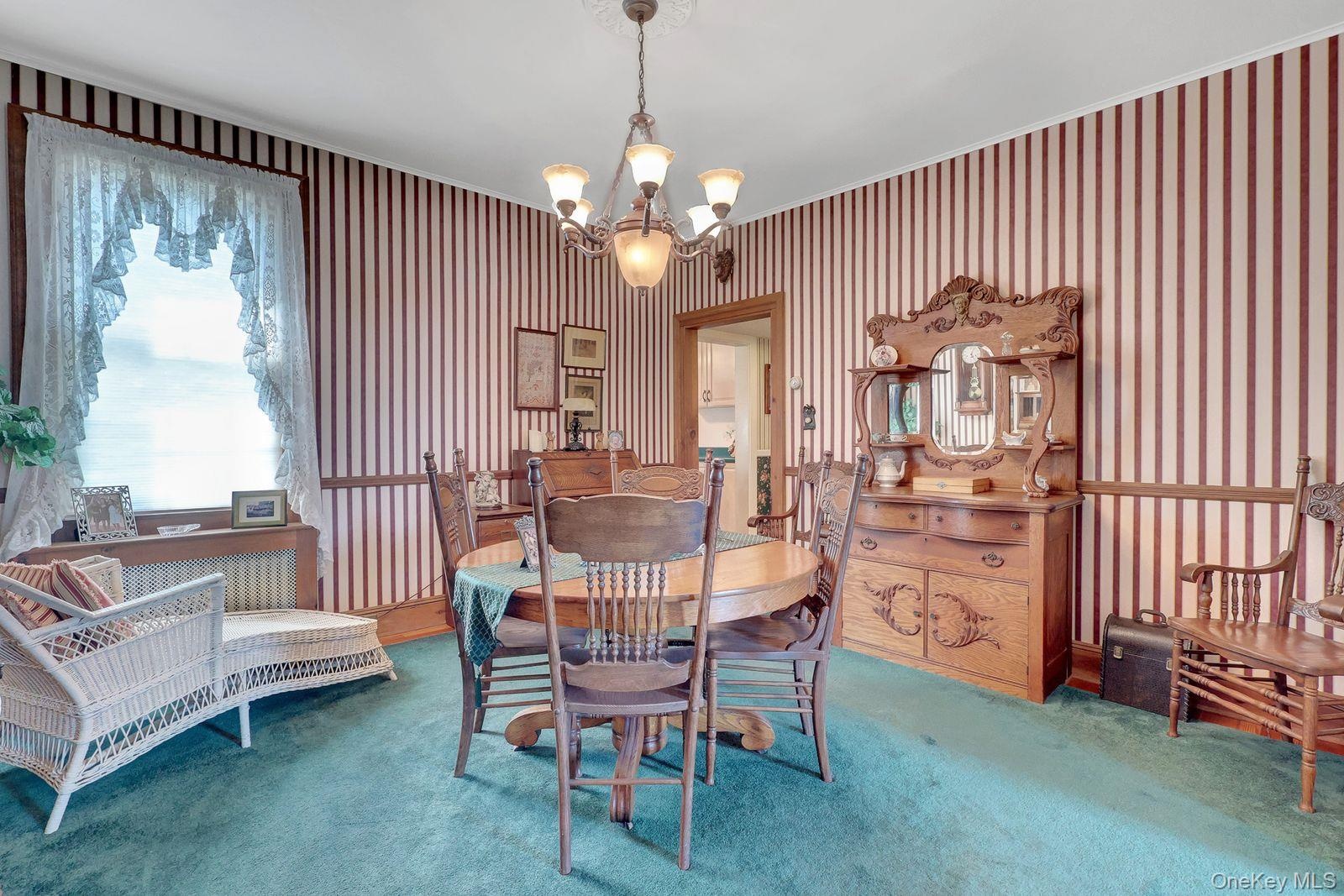 Formal dining room with hardwood floors