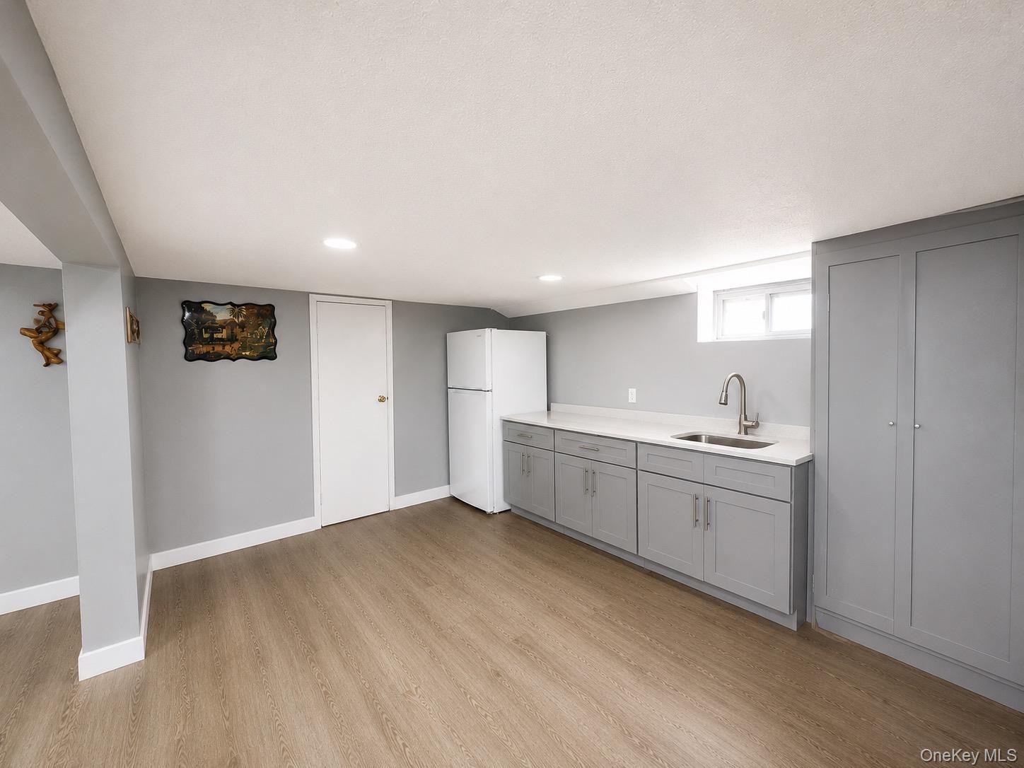 Virtually enhanced photo. Personal property and clutter have been digitally removed. Room dimensions and permanent features remain unchanged.