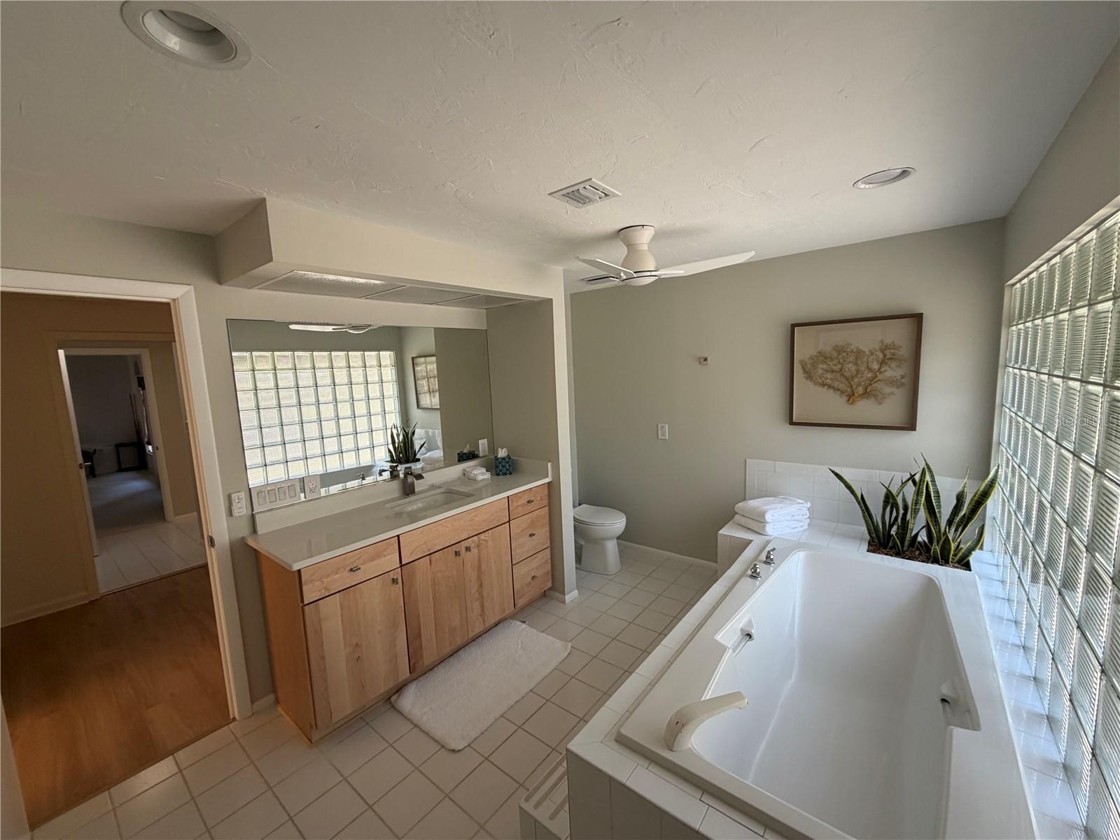 Lady's bath has a deep, long soaking tub.