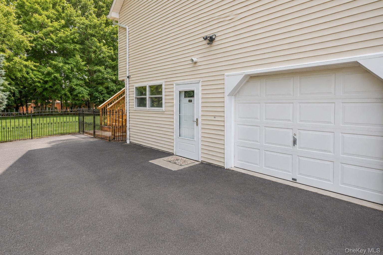 with walk out to fenced in yard
