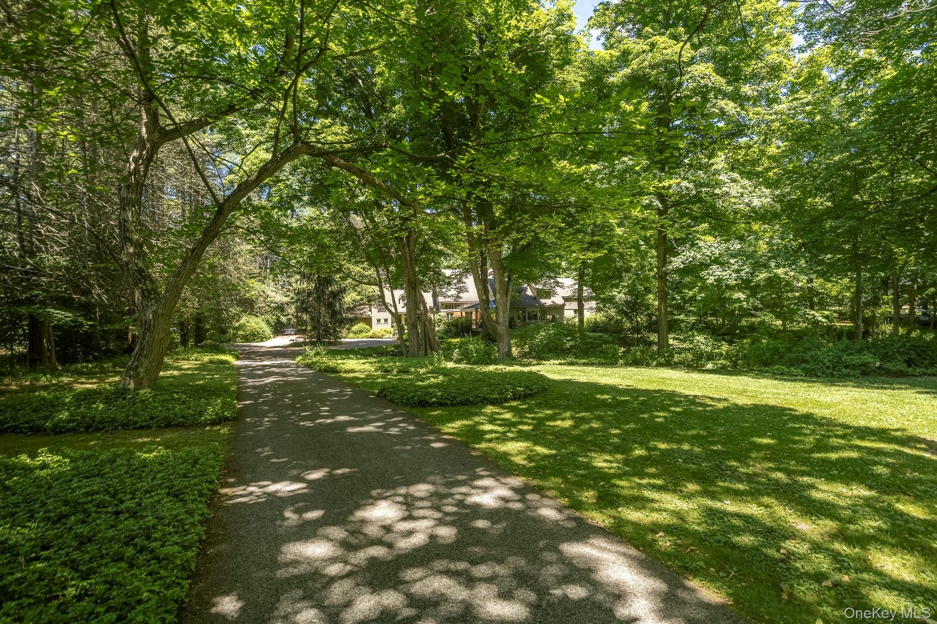 Set back from the road with a long private driveway, yet very conveniently located & accessible to everything