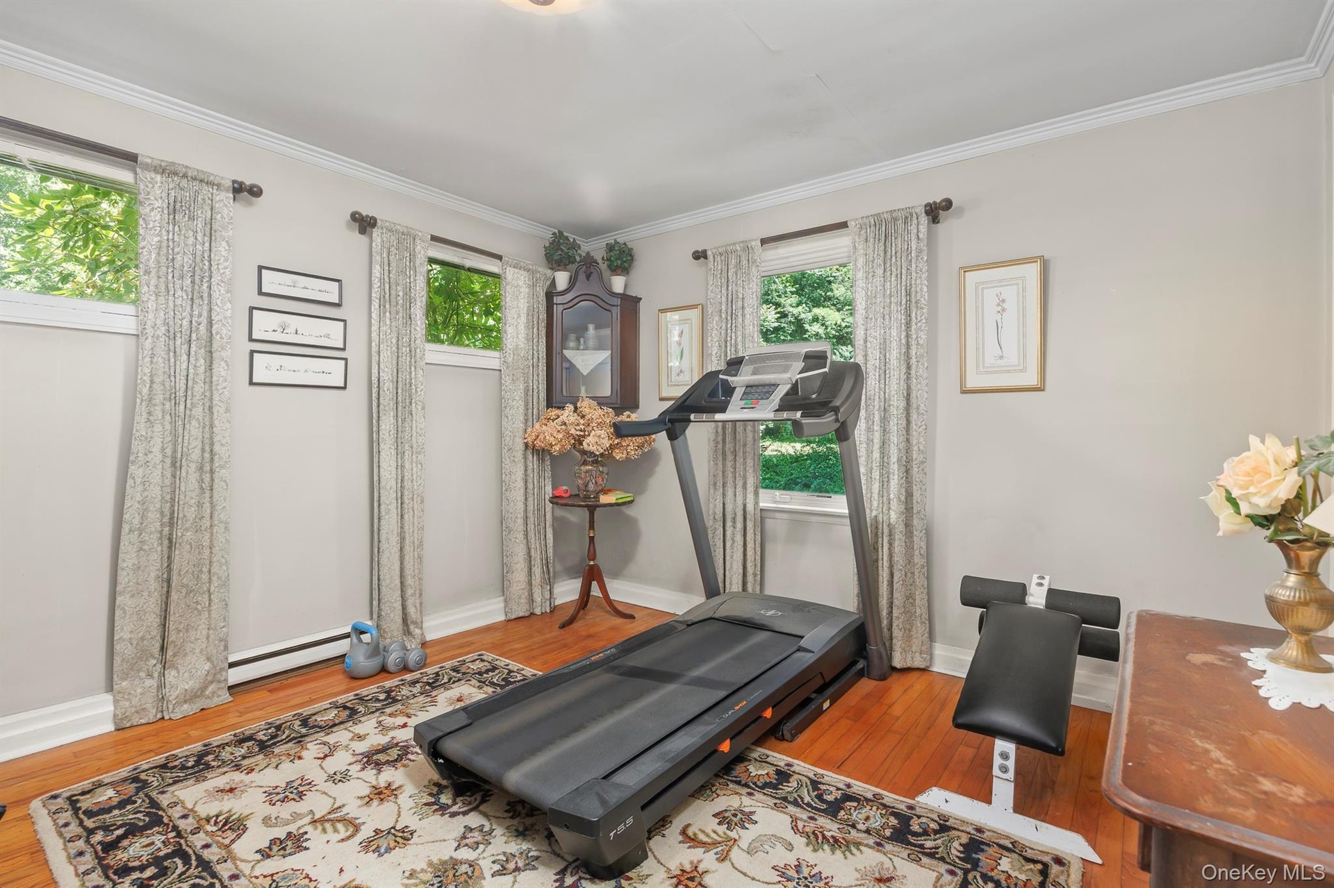 A bonus room is currently being used as an exercise room but could be a second office, playroom etc.