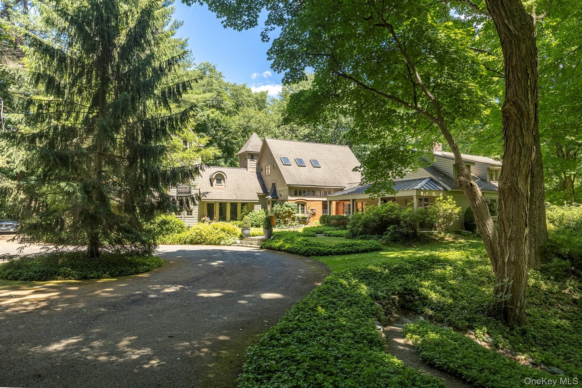 The view as you approach the home and circular driveway