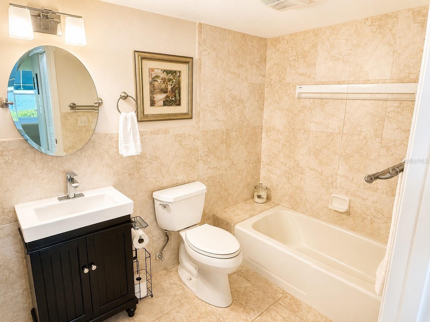 Primary Bathroom with tub and shower.
