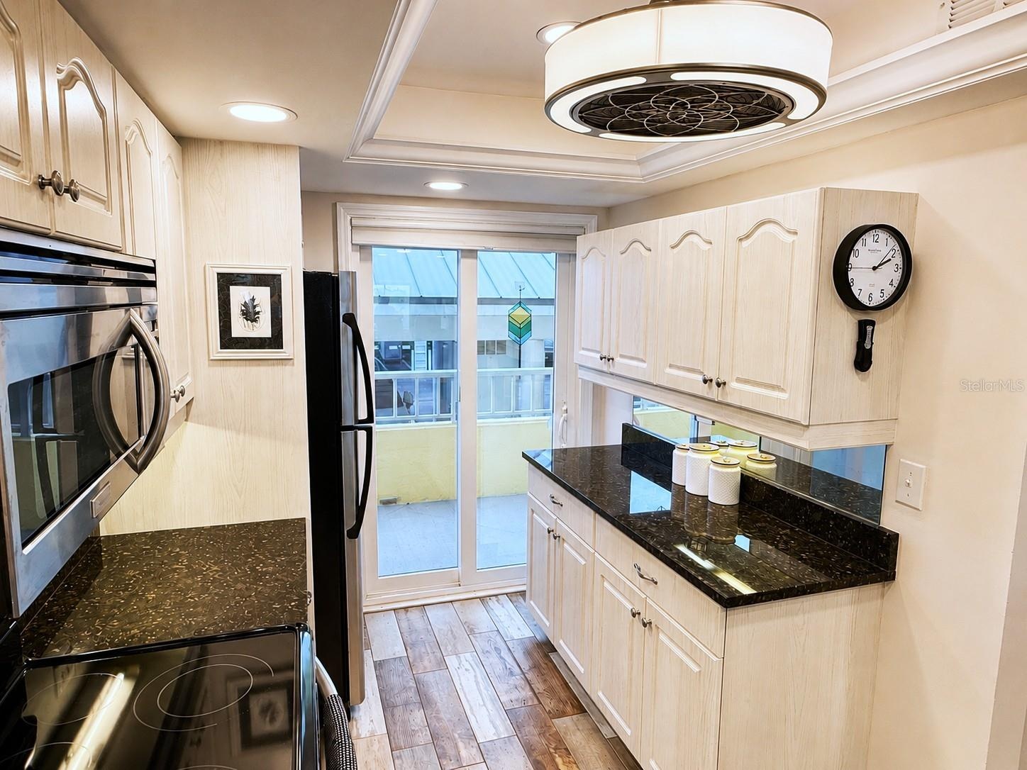 White Kitchen Cabinets, black granite! Beautiful!