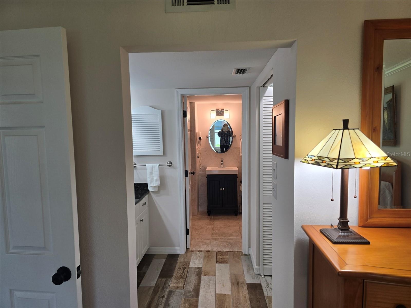 Vanity area between bedroom and bath.
