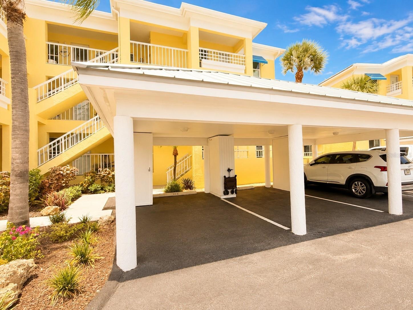 Carport area covered to condo. Guest Parking!