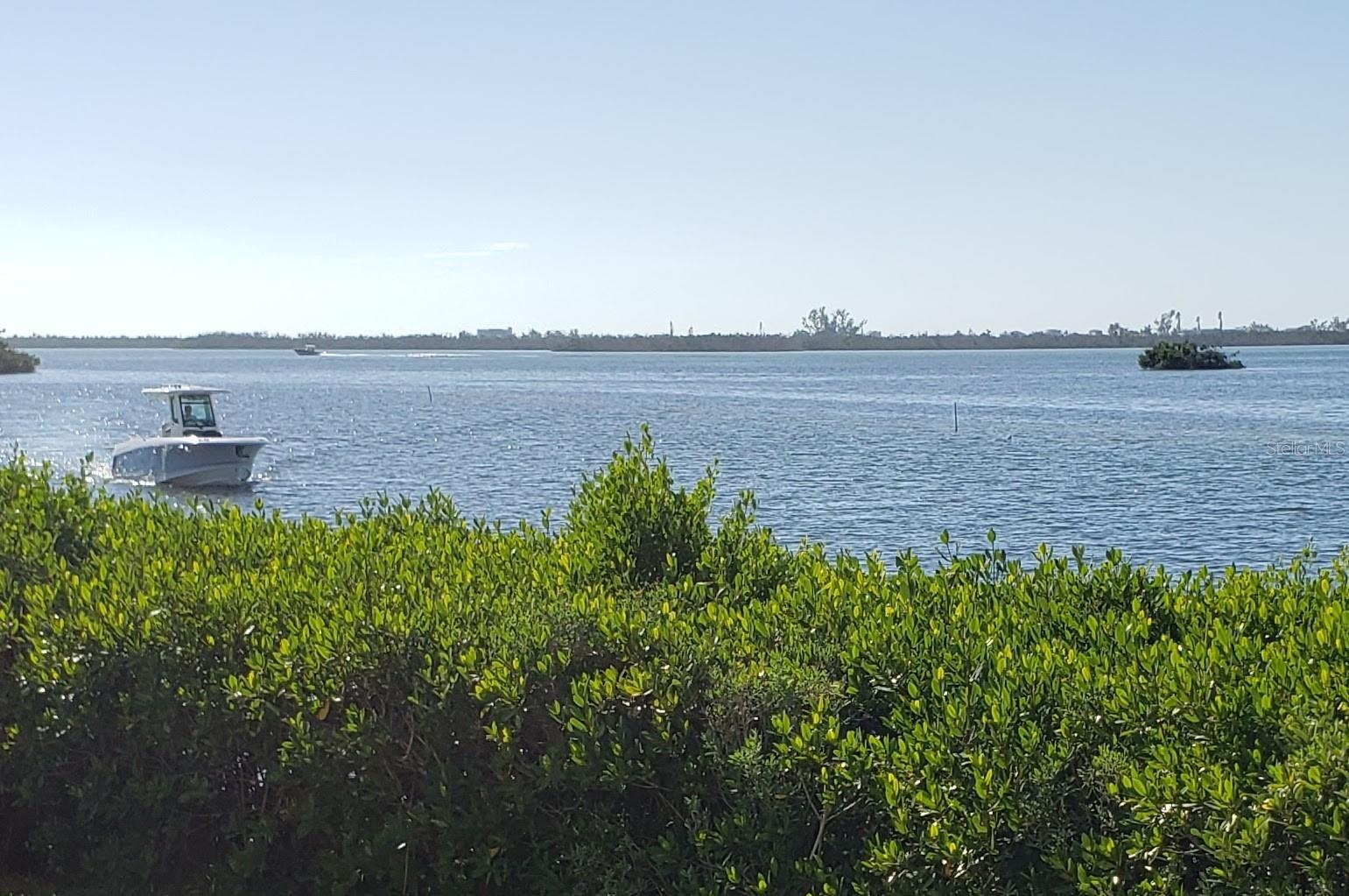 Here comes a boat in the channel going to Marina!