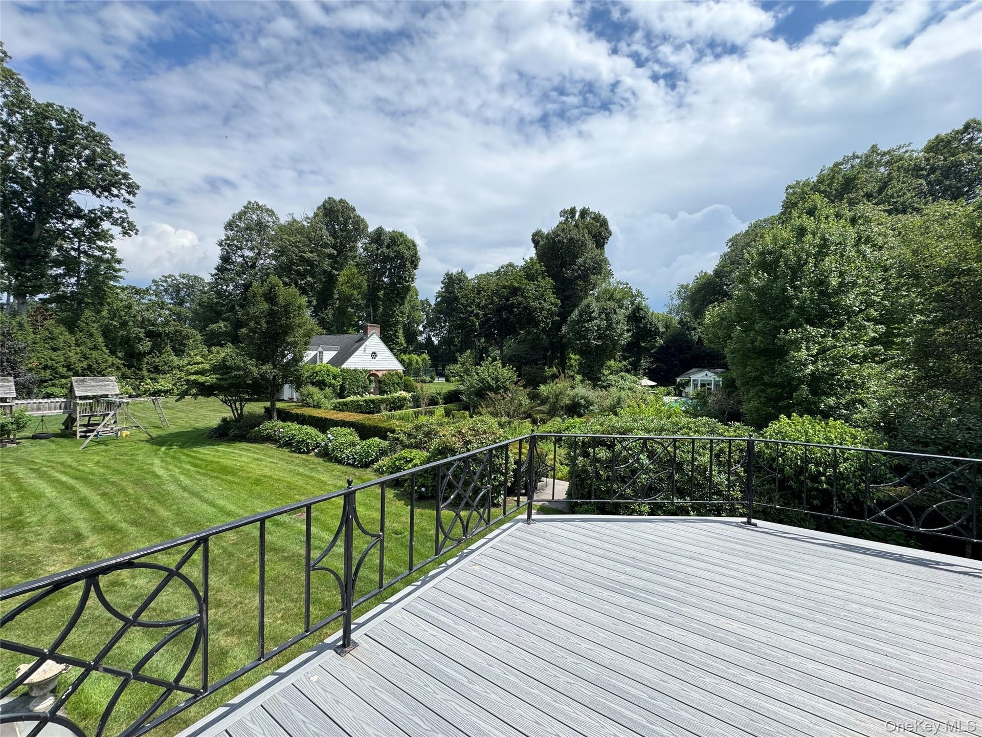 Balcony off the Primary Bedroom overlooking the property