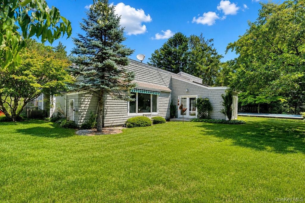 Home surrounded by mature landscaping