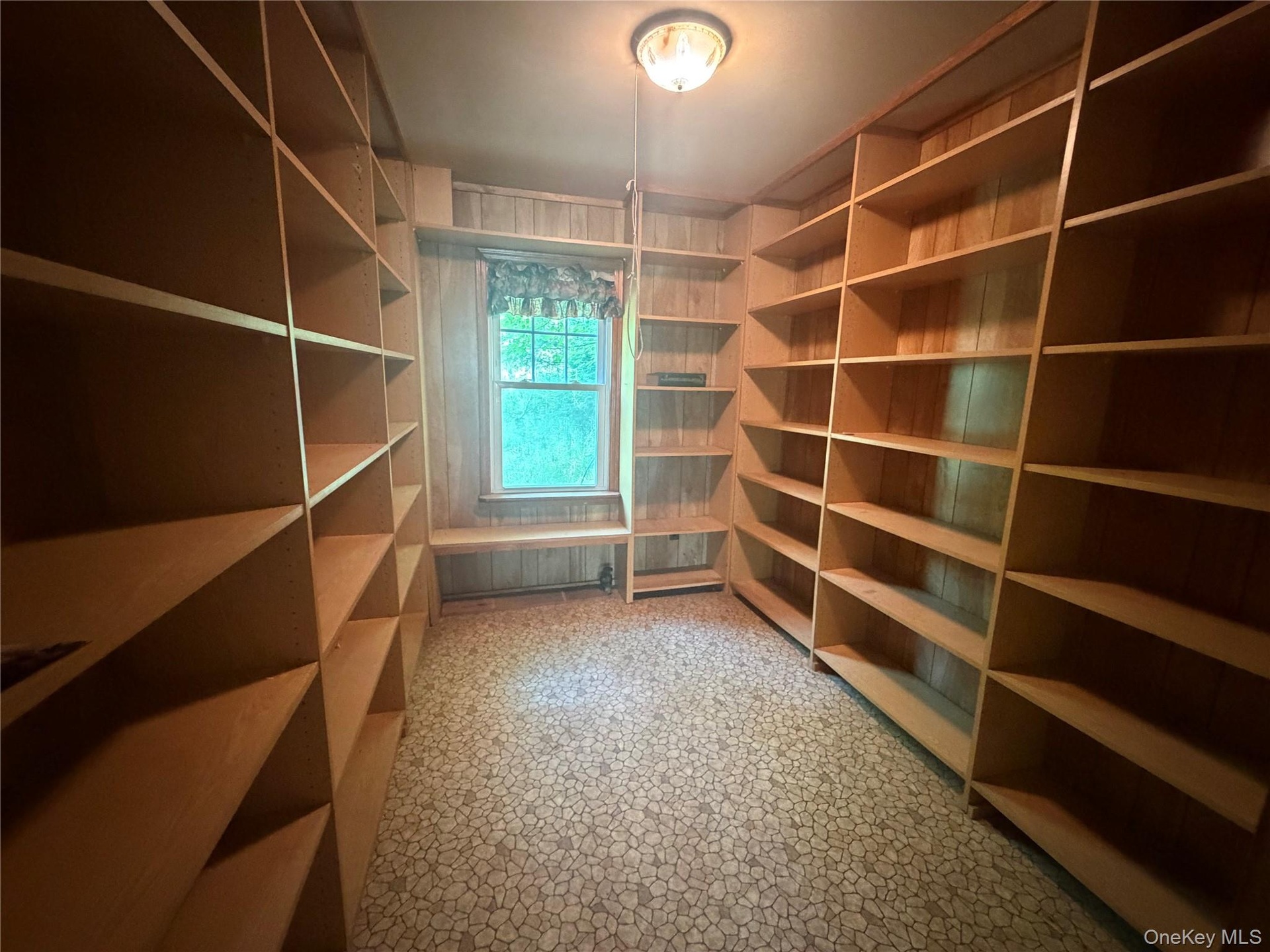 The former owner used this as a library.  It could easily be a pantry, collectable room or seasonal storage