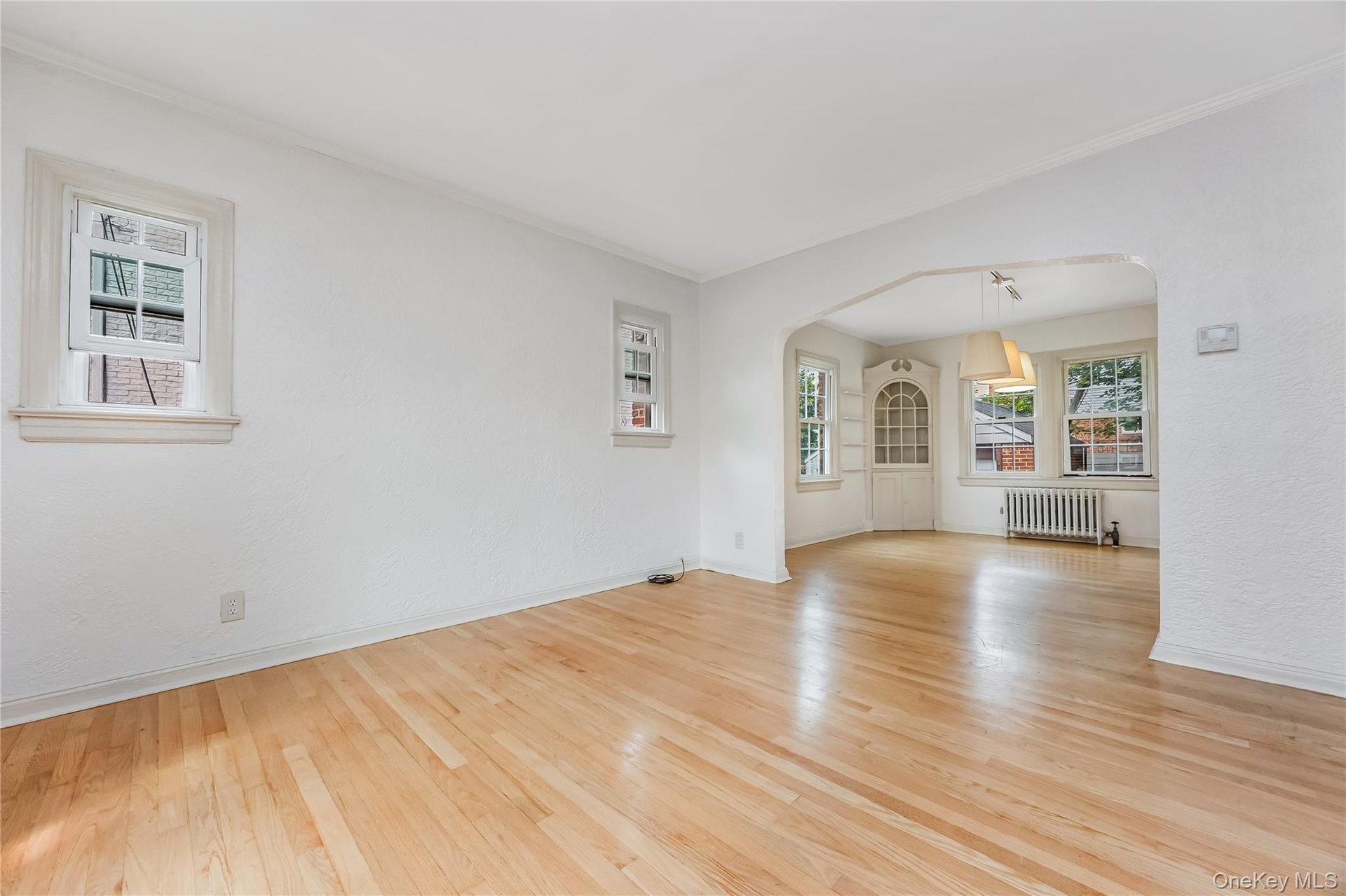 Living room opening to dining area