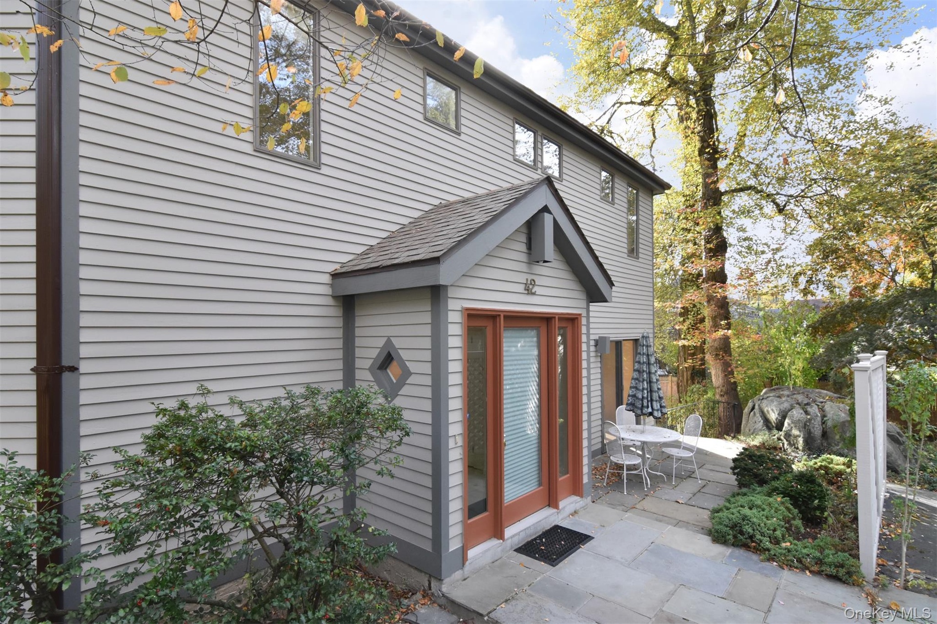 Entrance to property featuring a patio