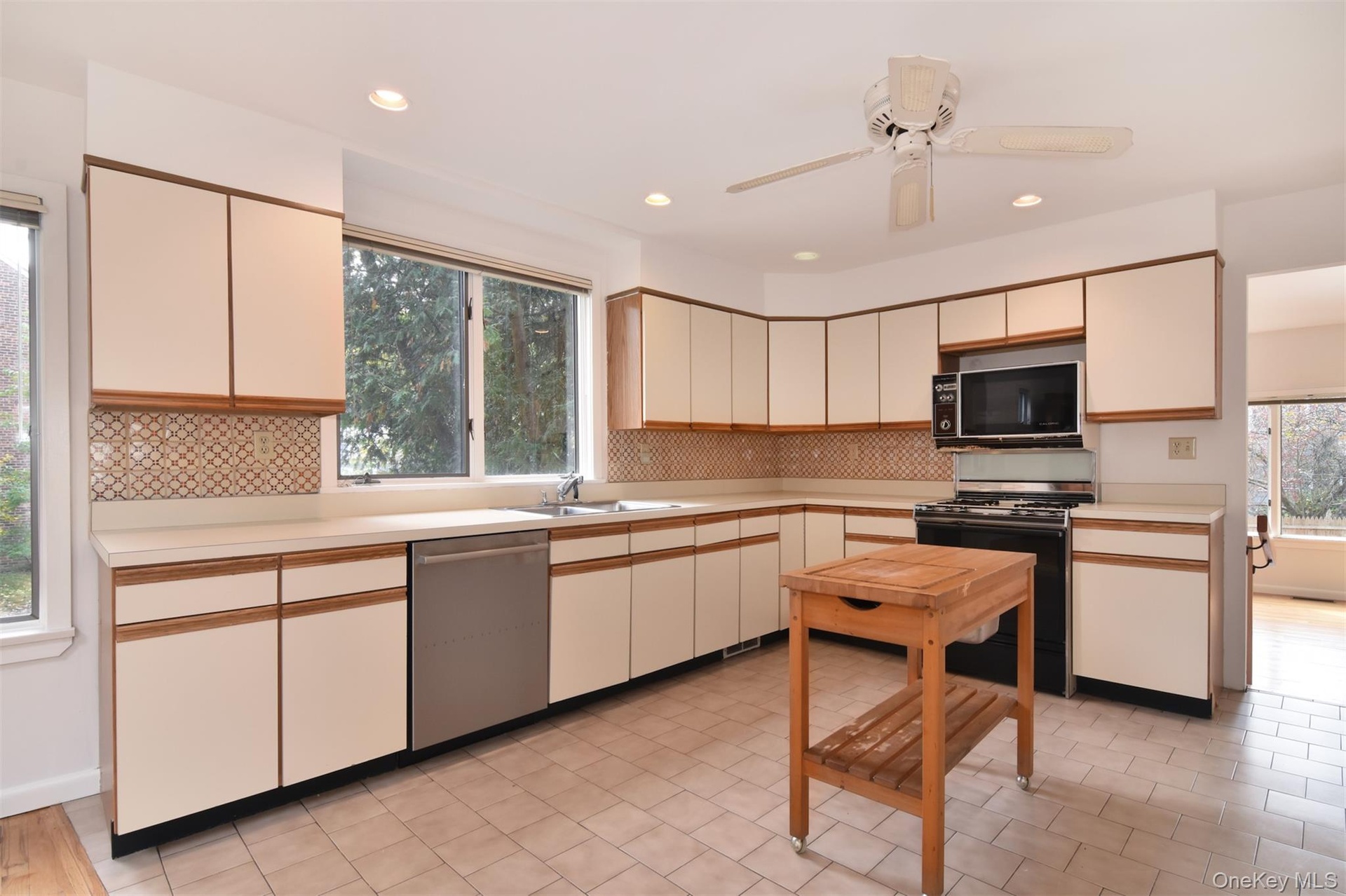 Large Kitchen centrally located between the Great Room and Living/Dining room