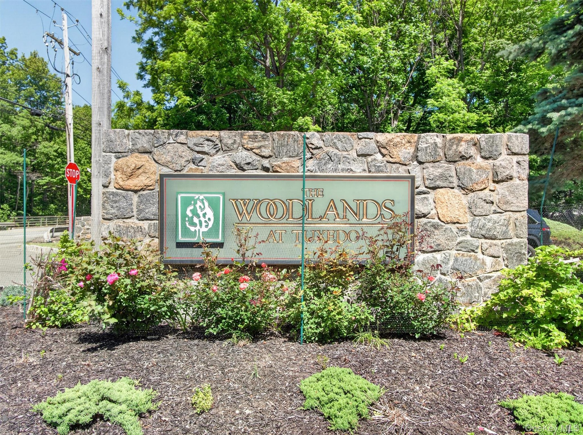 Professionally landscaped entrance monument.