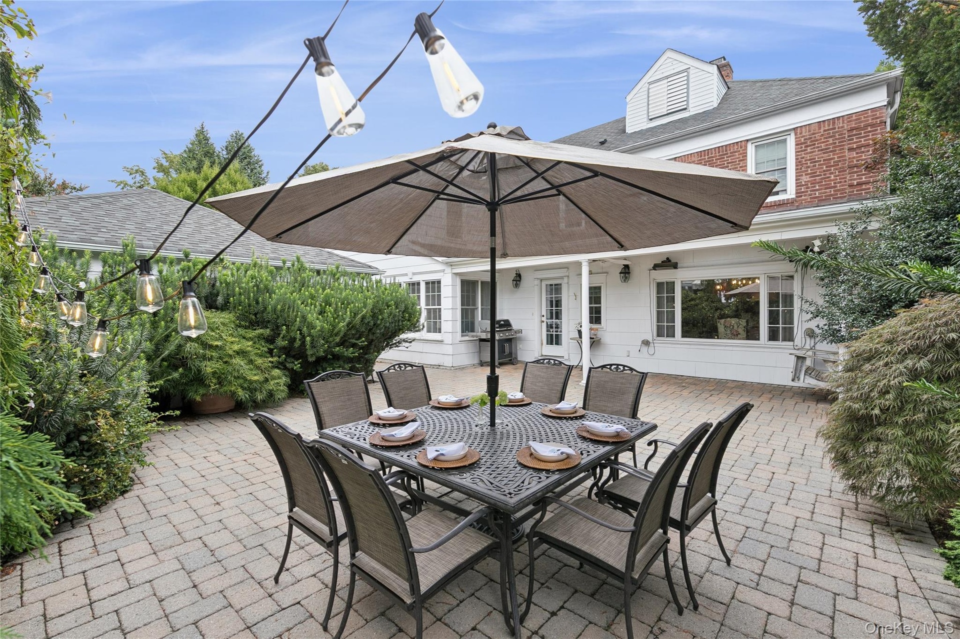Huge back patio is perfect for alfresco dining