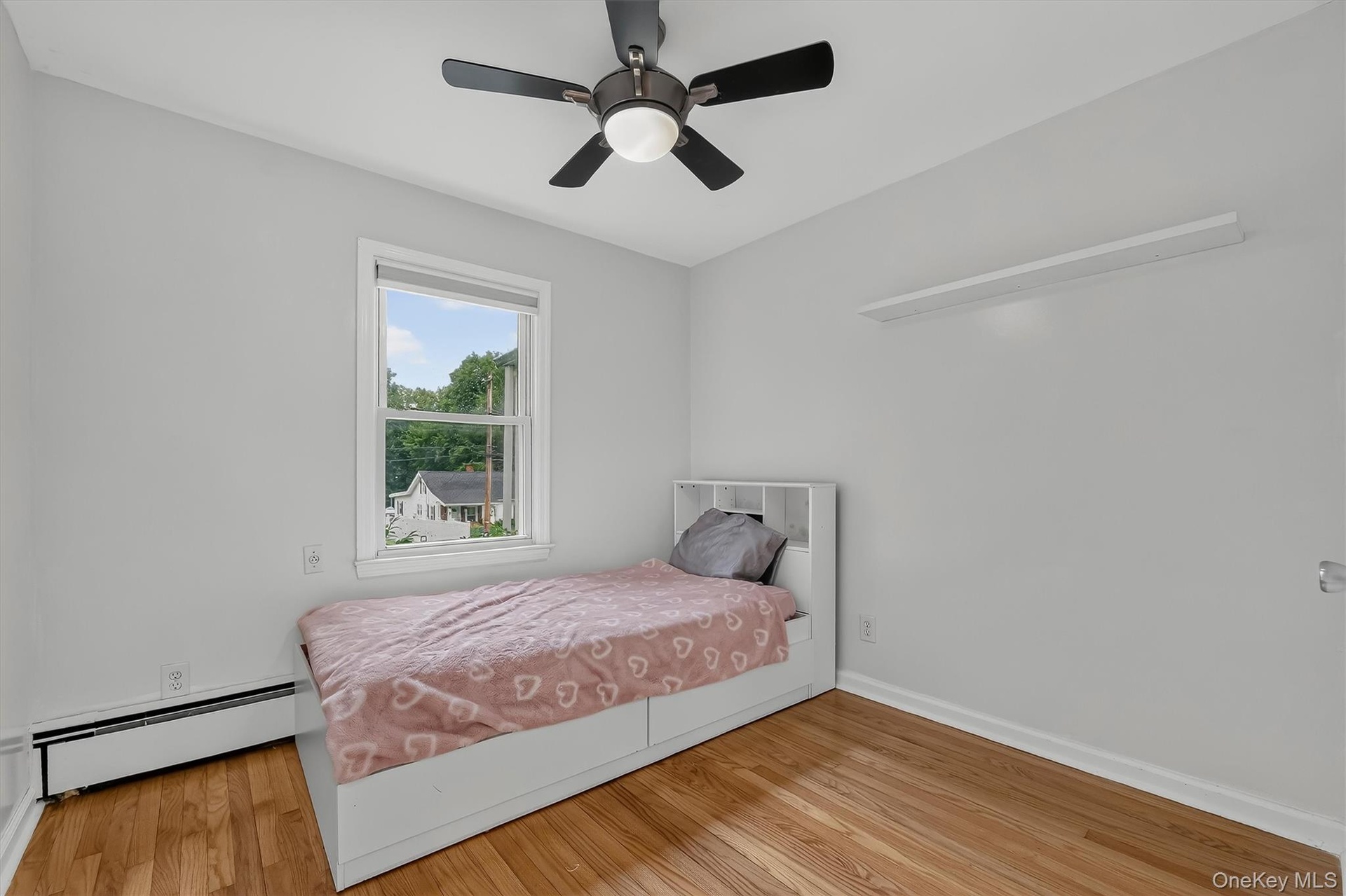 Bright and inviting second bedroom.