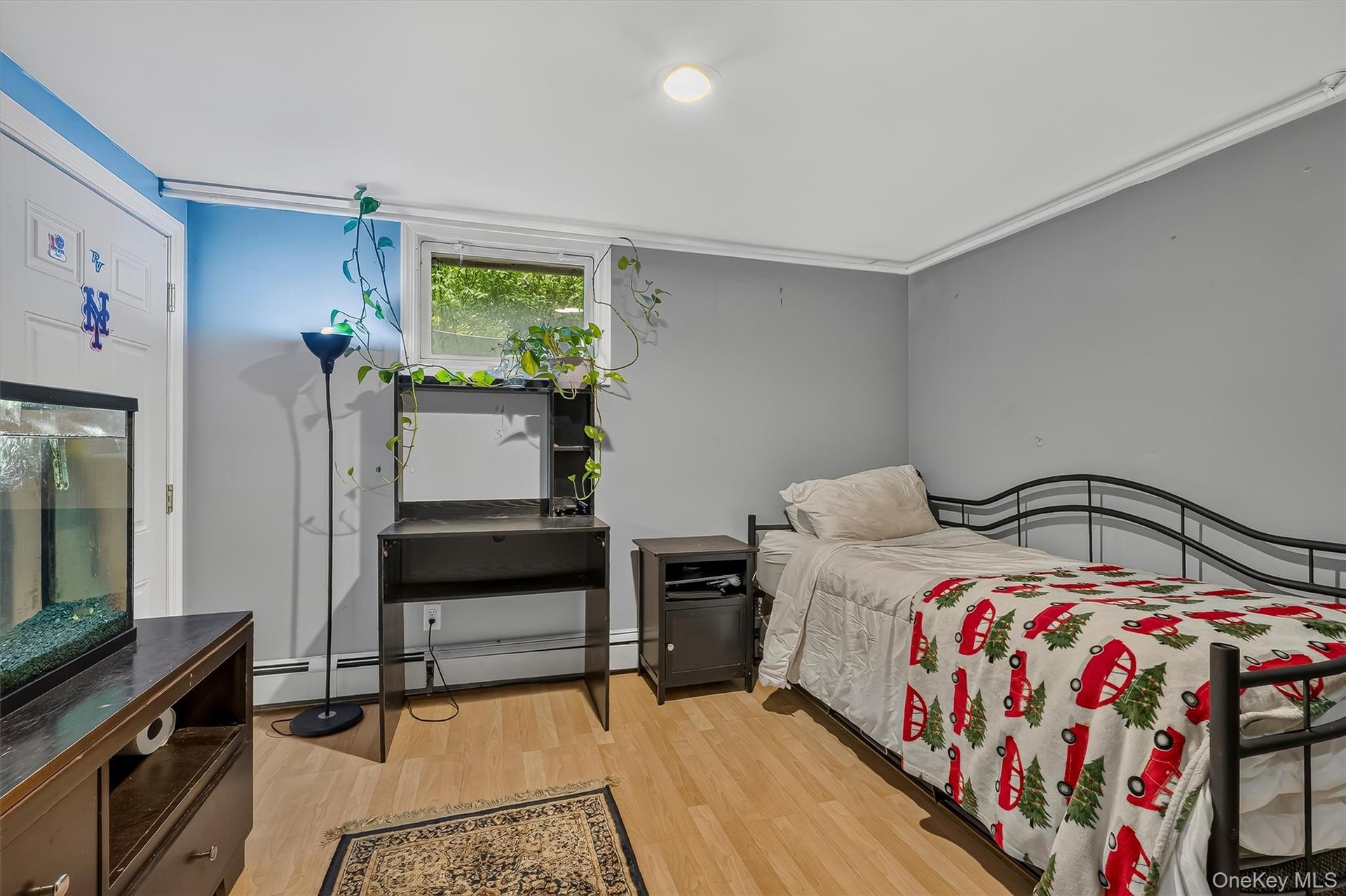 Additional room ideal for a home office, guest room, playroom, or hobby space.