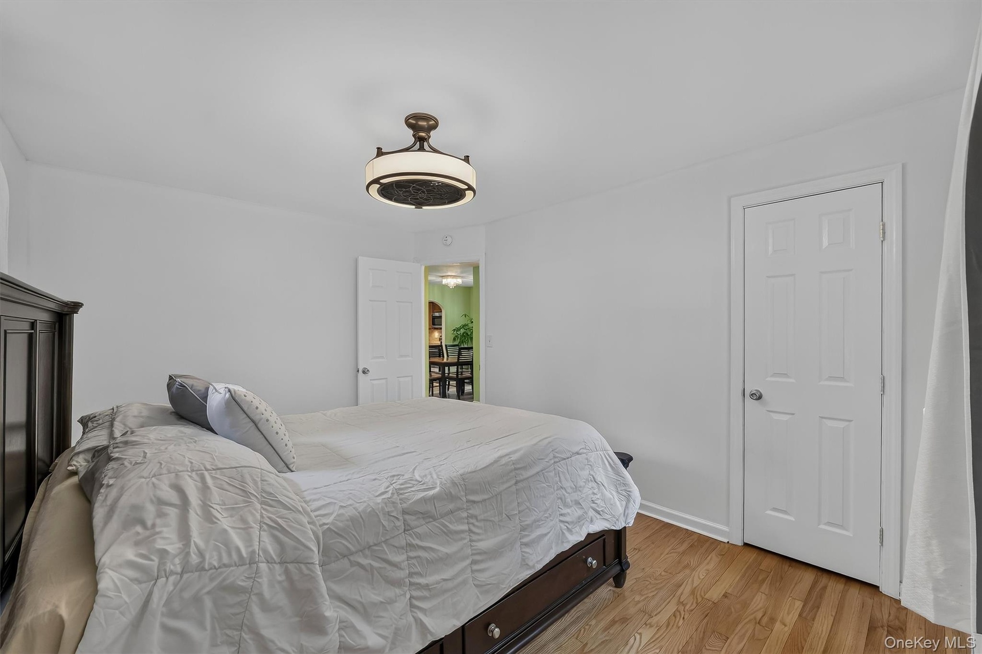 Bright and comfortable primary bedroom provides a peaceful space to relax and unwind.