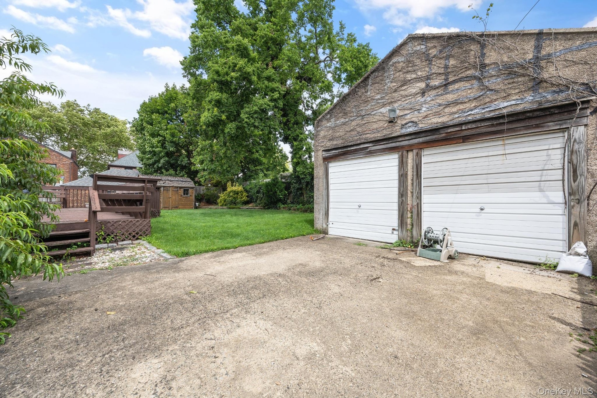 Detached Garage – Detached two-car garage featuring a spacious private driveway with ample off-street parking and additional storage. Conveniently loc