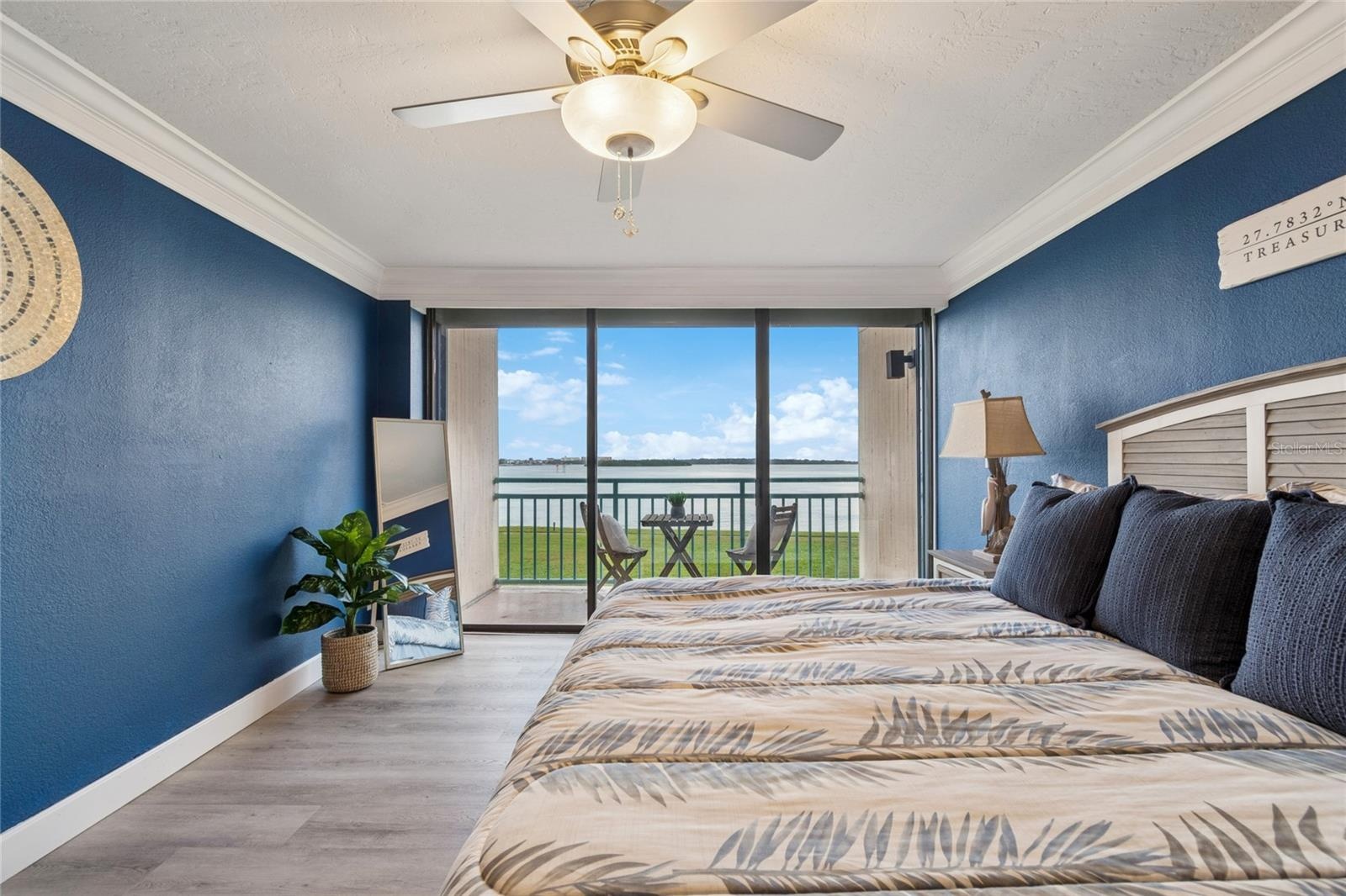 Stunning view from primary bedroom with private balcony.
