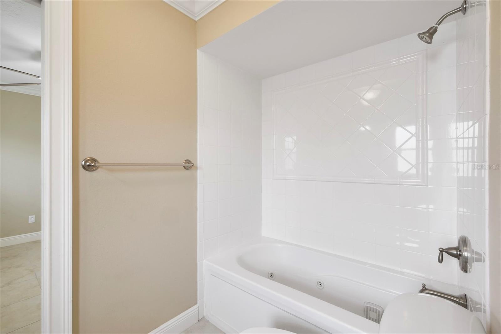 Two Bedrooms share a convenient JACK-AND-JILL BATH.
