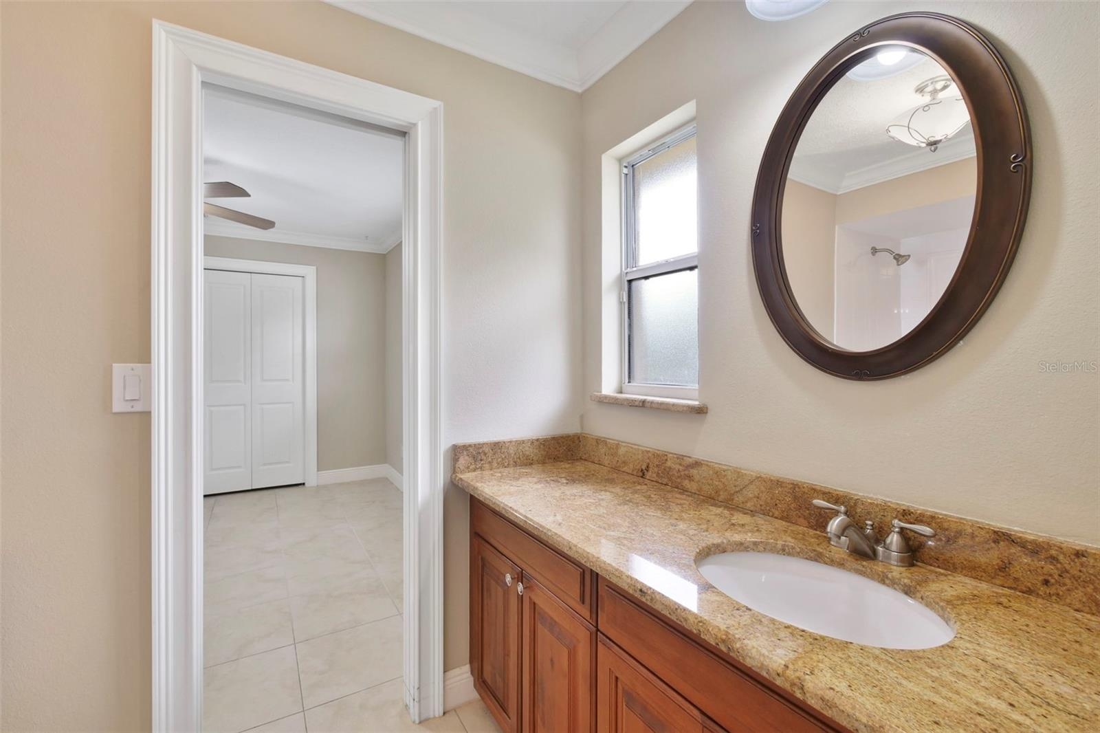 Two Bedrooms share a convenient JACK-AND-JILL BATH.
